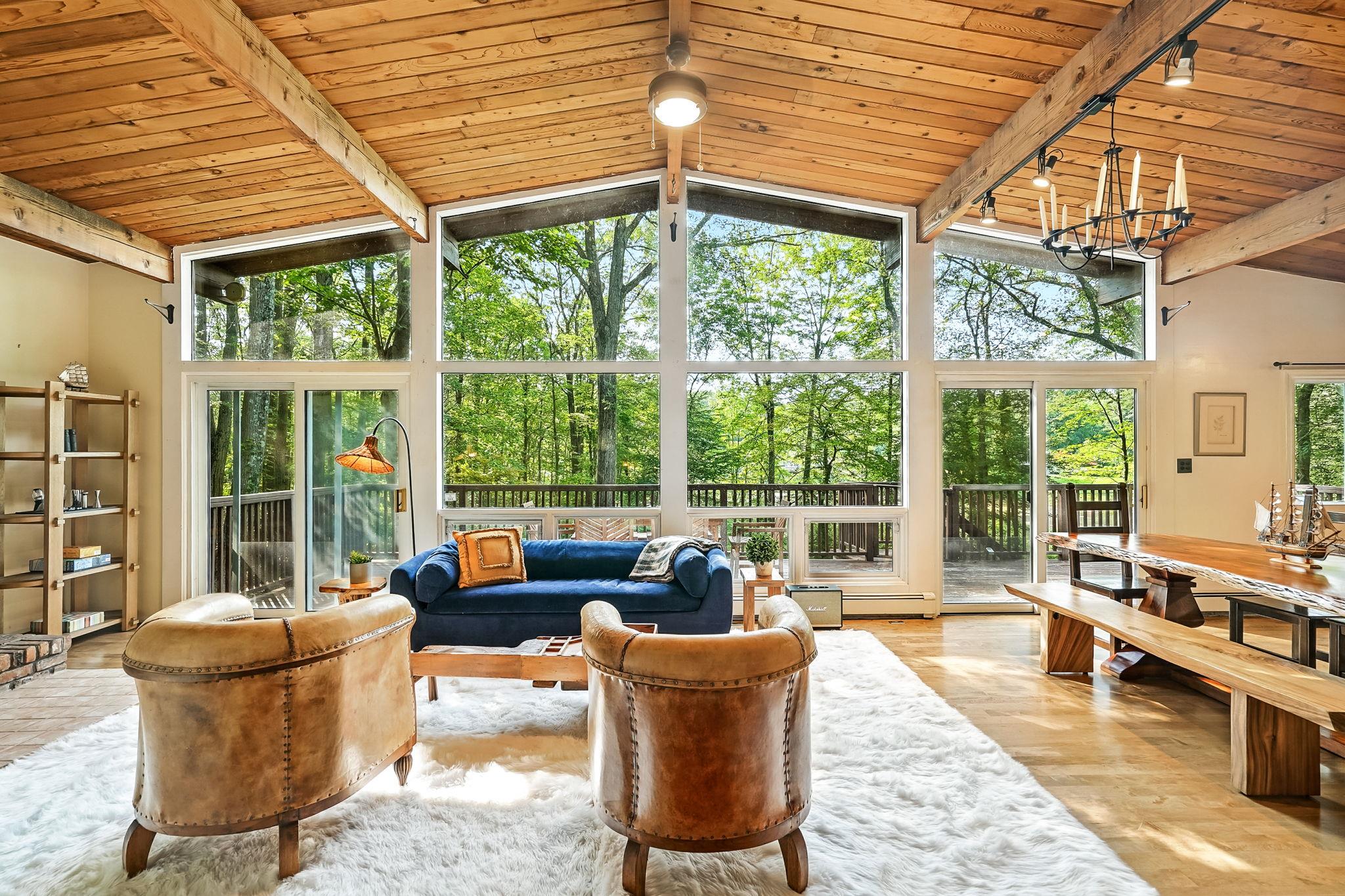 Featured in the New York Times!  Nestled on a private lake, this stunn...