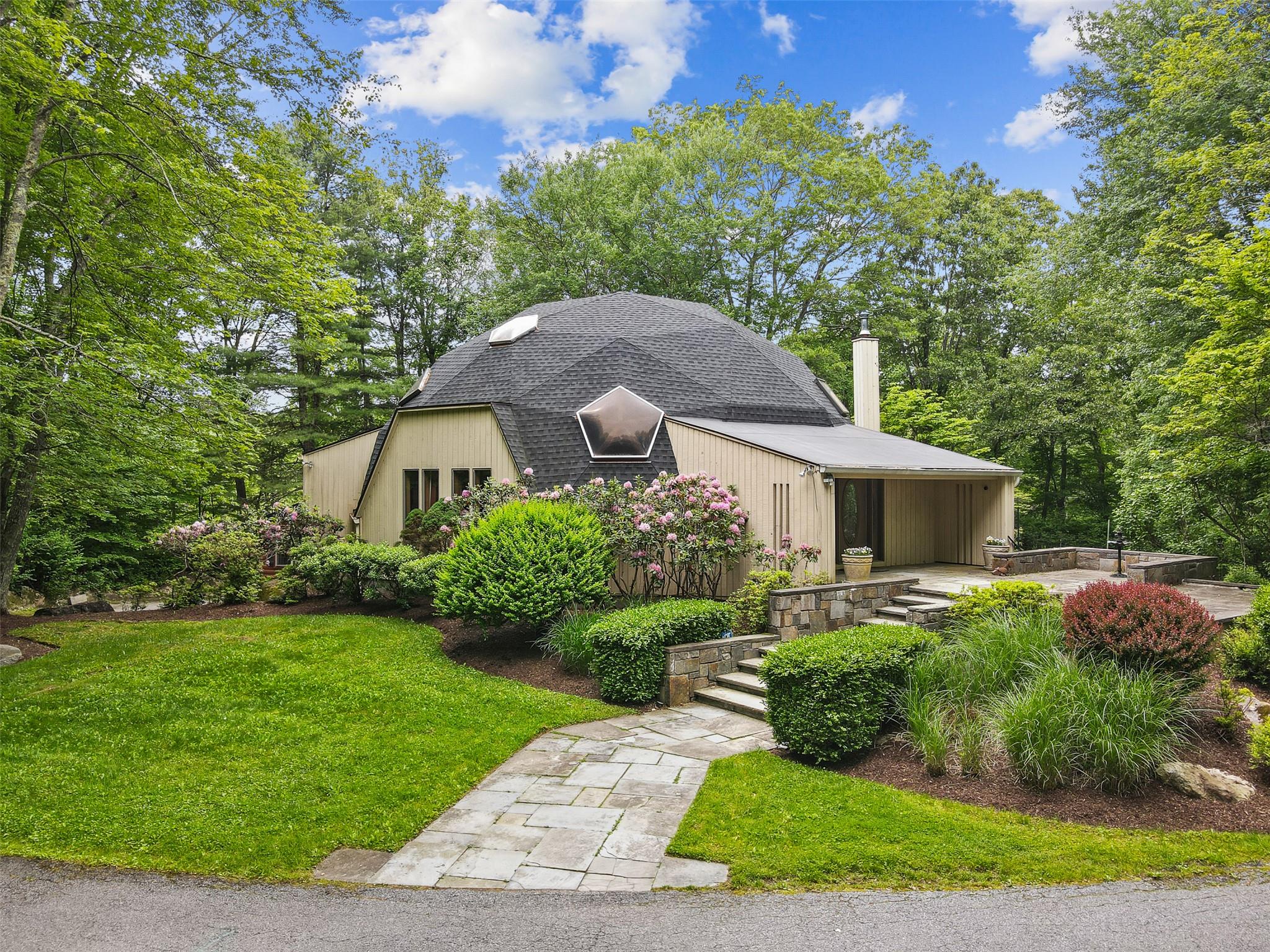 Welcome to one of Northern Westchester’s most architecturally unique a...