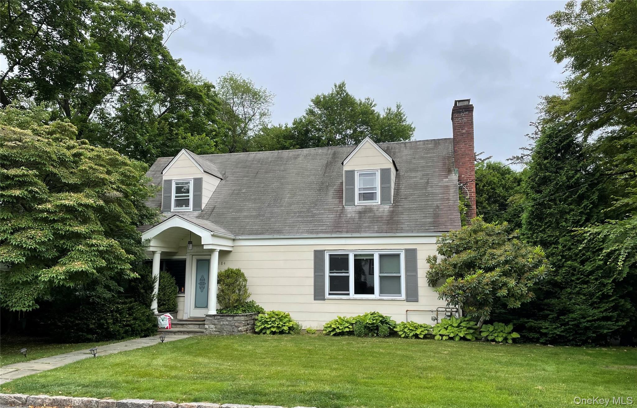 Charming home in the Edgewood section of Scarsdale. Hardwood floors th...