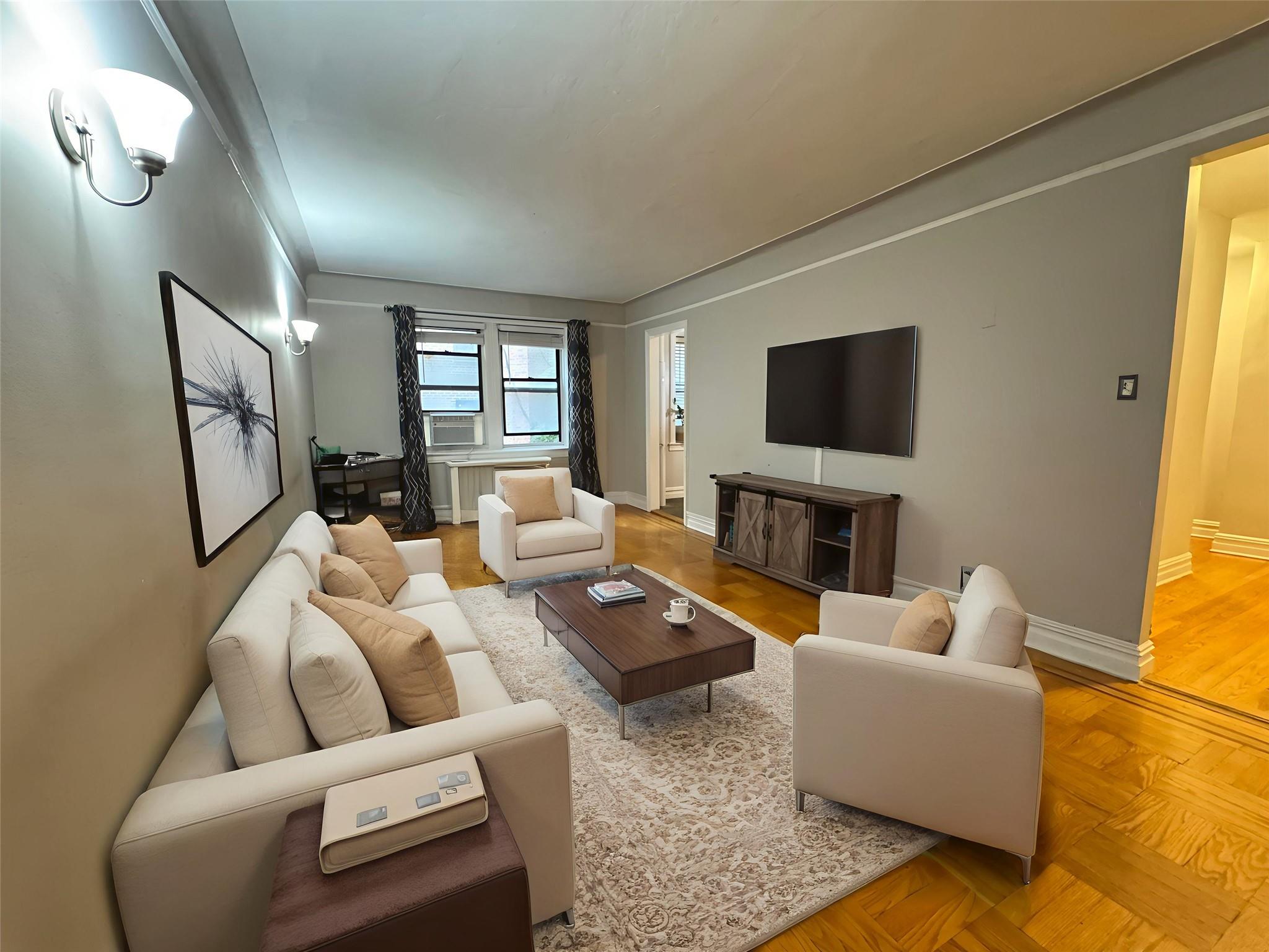 Welcome to 10 Nosband Ave, Apt 4J – a bright and spacious 1-bedroom ap...