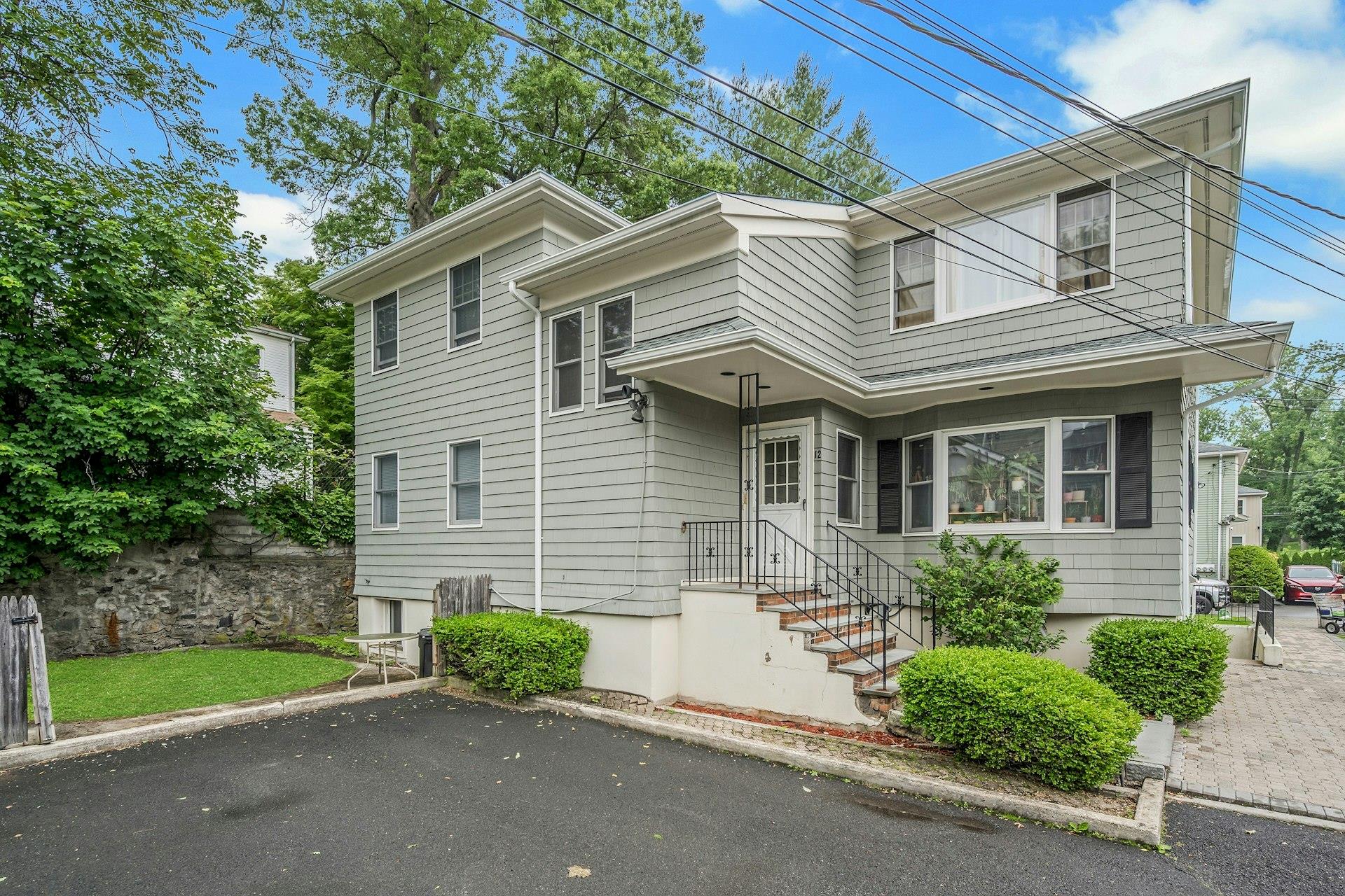 This beautifully maintained two-family property offers the perfect set...