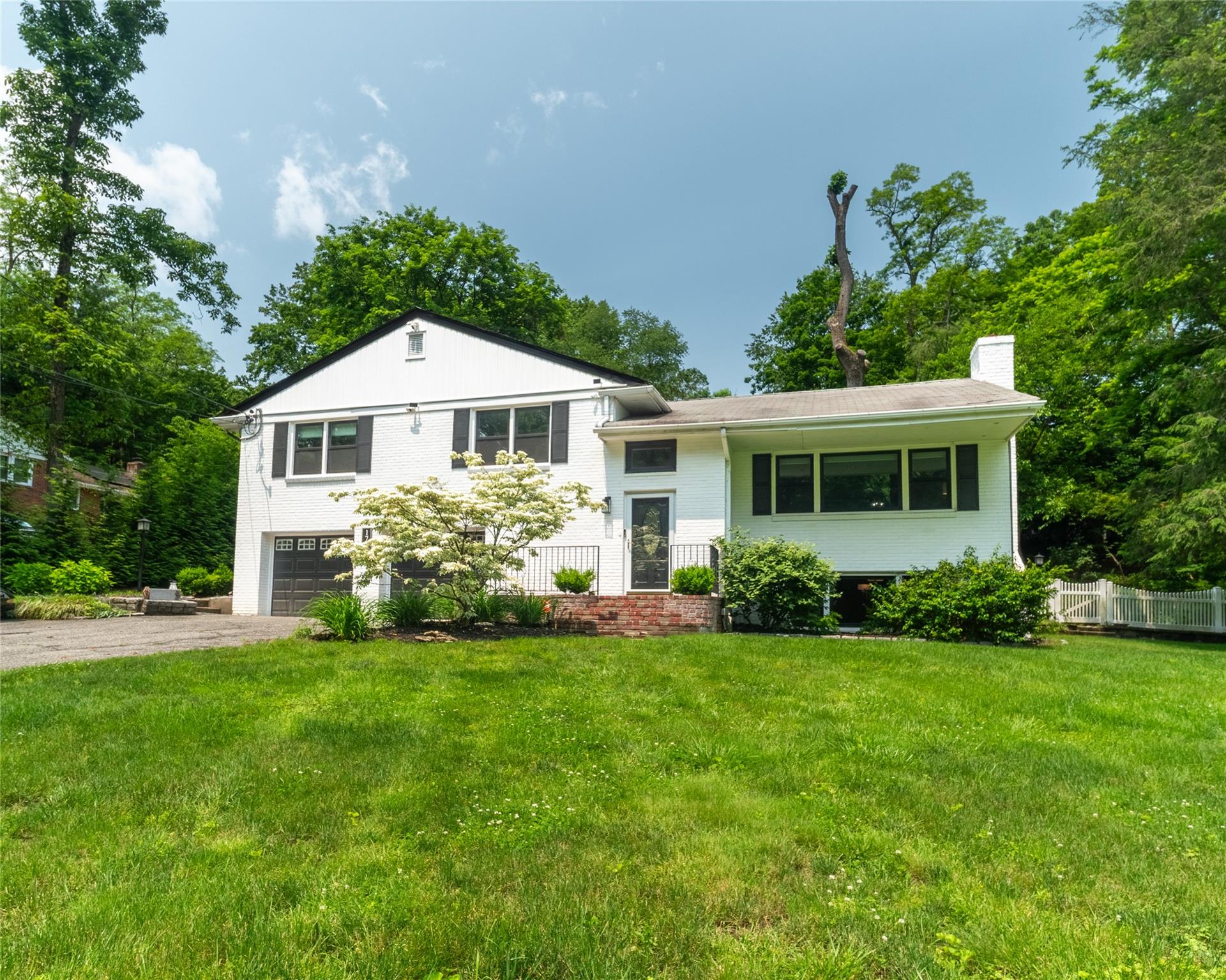 Beautiful home on .83acre is a pure gem. Magnificent tiered landscaped...