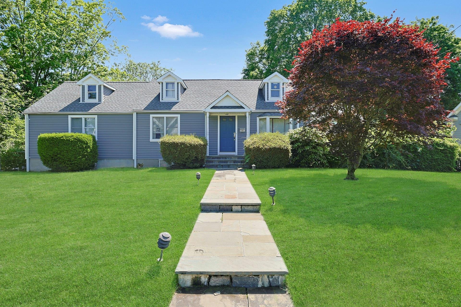 Charming and spacious 5-bedroom, 3-bathroom Cape Cod/Colonial set on a...