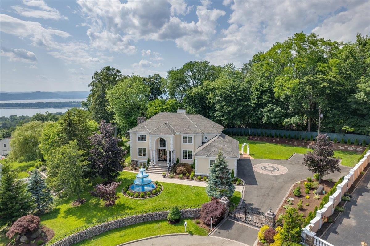Panoramic Hudson River Views | Custom Architecture | Resort-Style Amen...