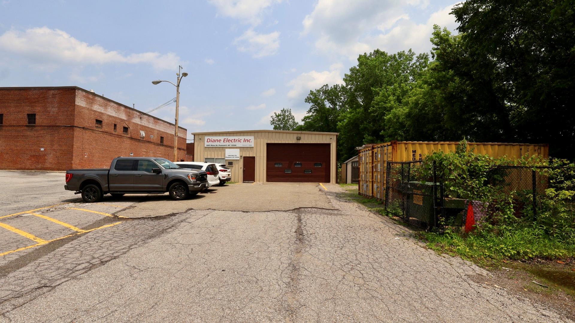 Single-story industrial-flex property 6,804 sqft on one acre next to a...