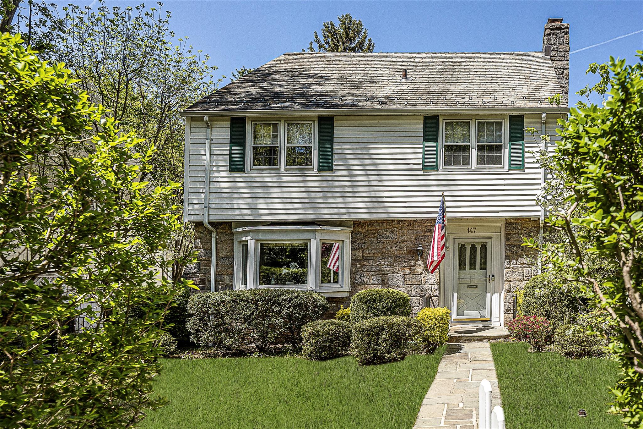 Ideally located just steps from schools, town, and the train, this cha...