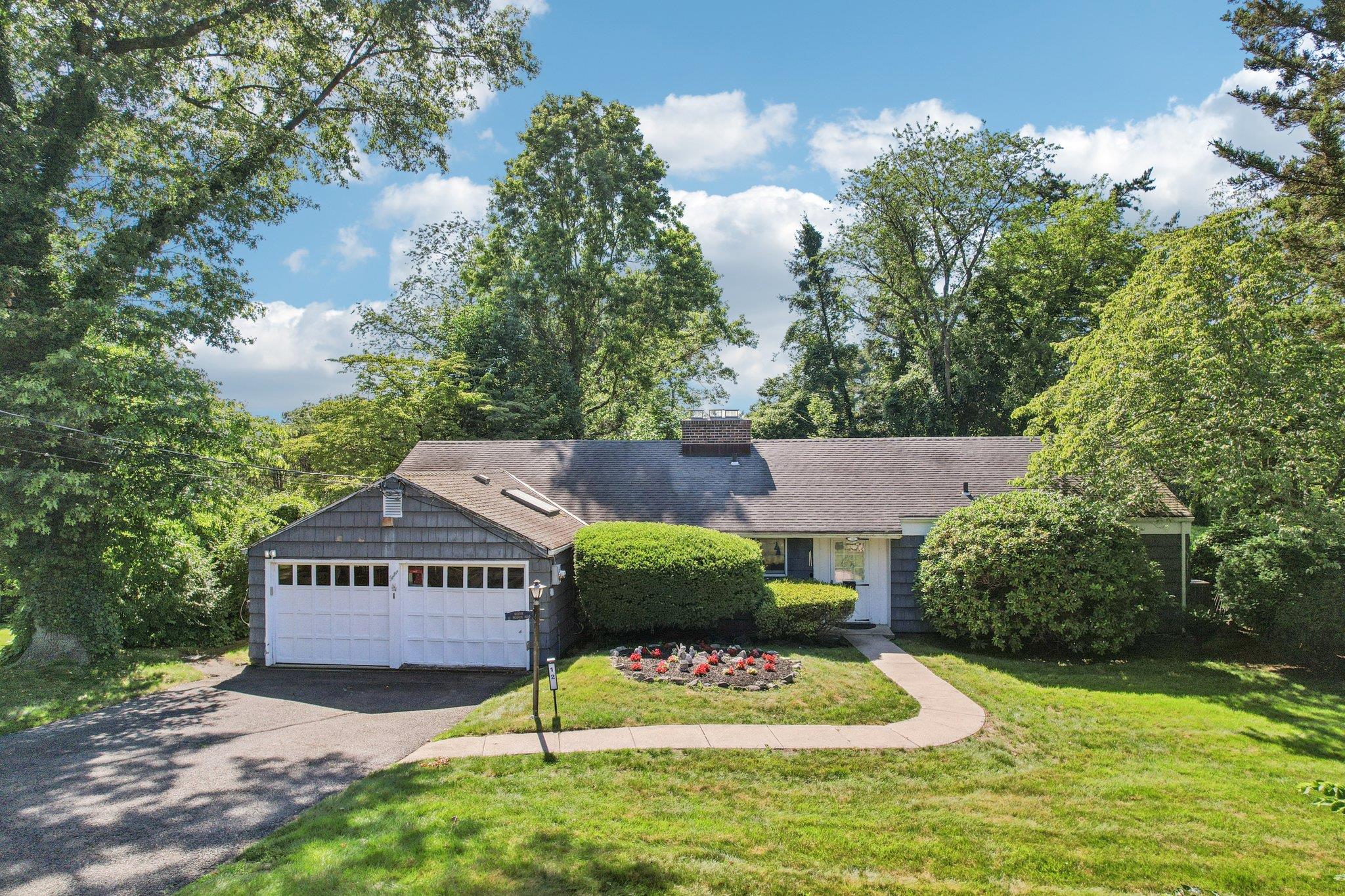 Welcome home to this classic 3 Bedroom, 2 Bath expanded Ranch in the a...