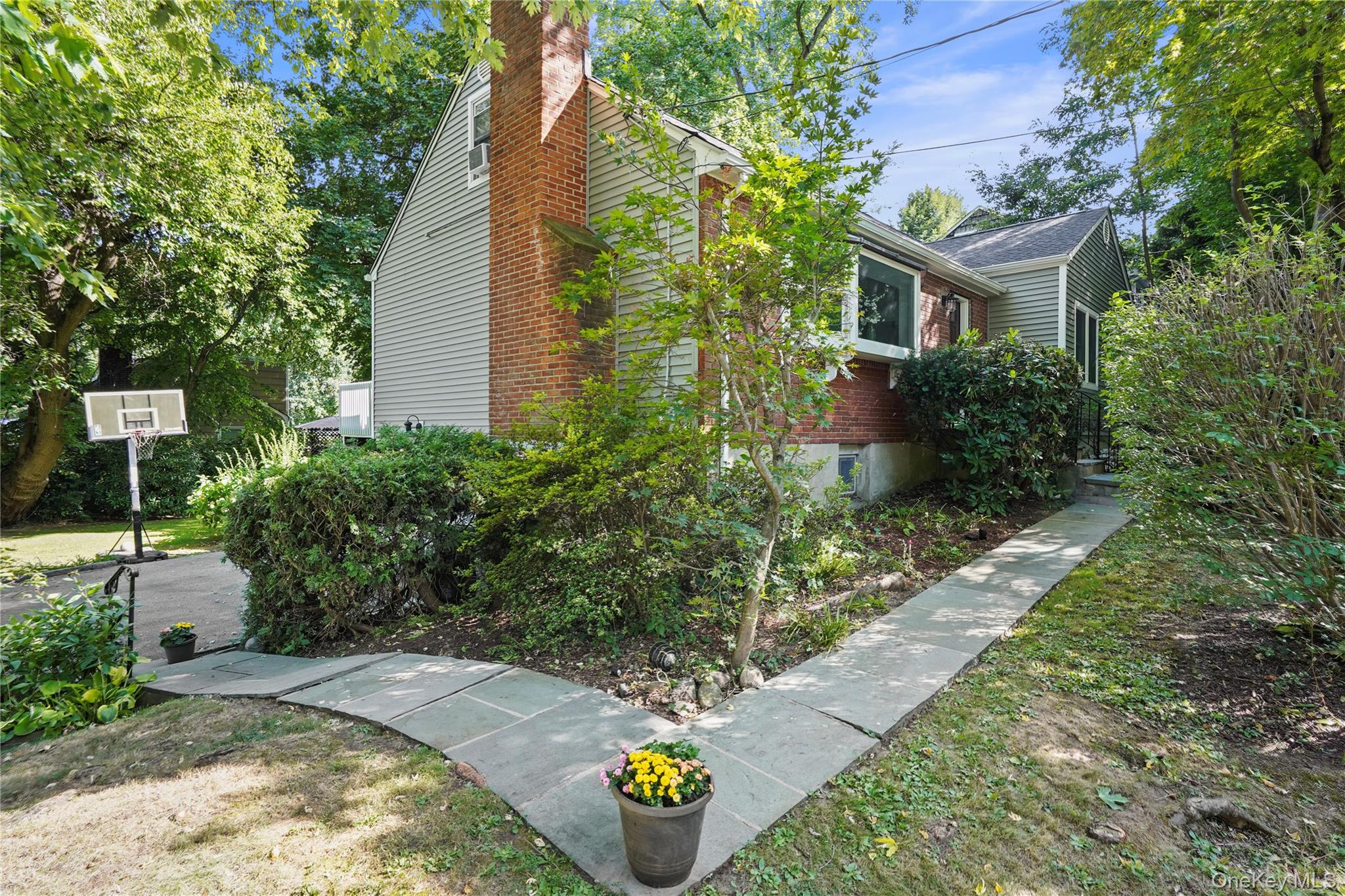 Welcome to 812 Fenimore Road in Larchmont, a nicely maintained Cape Co...