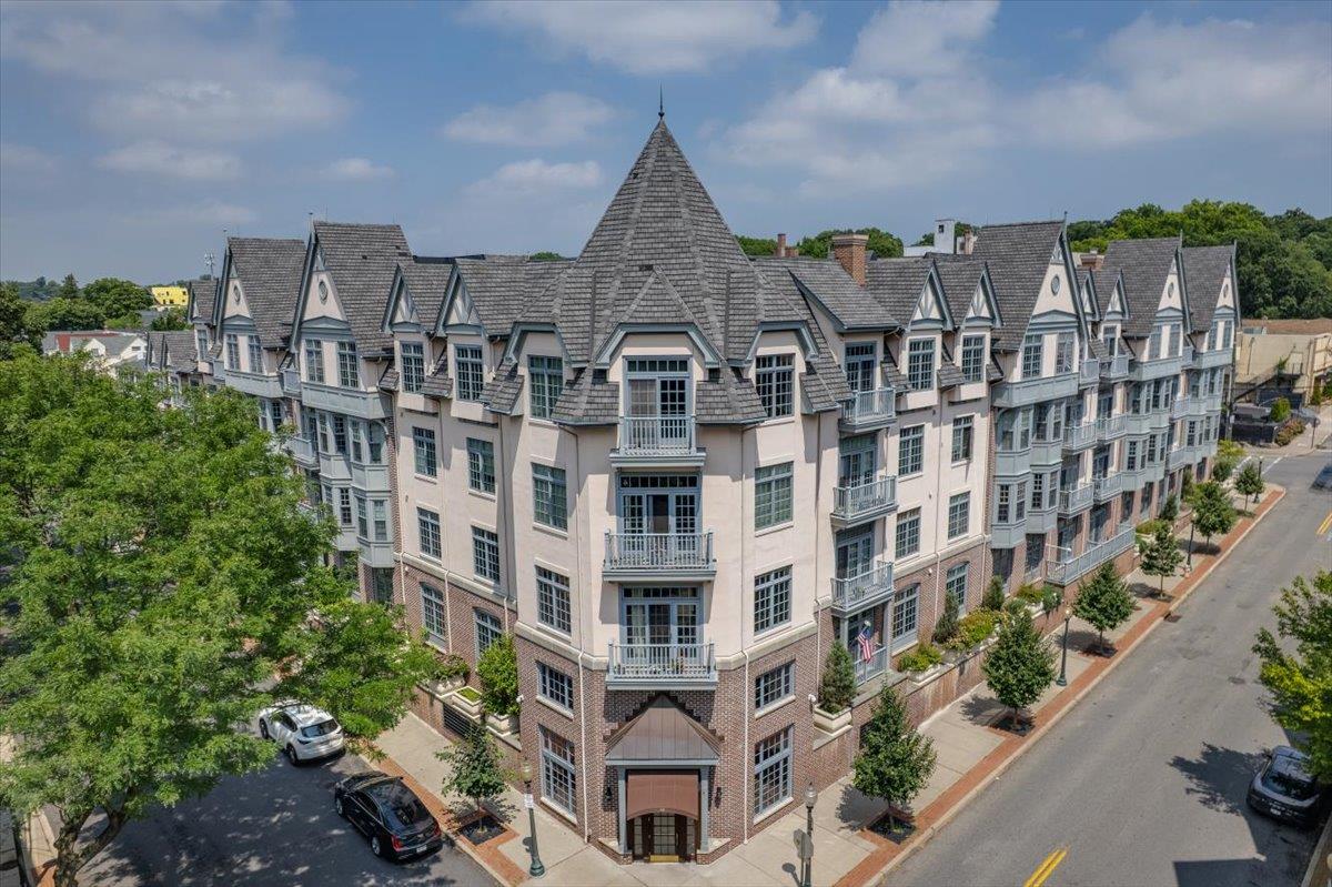 Sophisticated and sunlit, this prime corner 2-bedroom, 2-bath condomin...