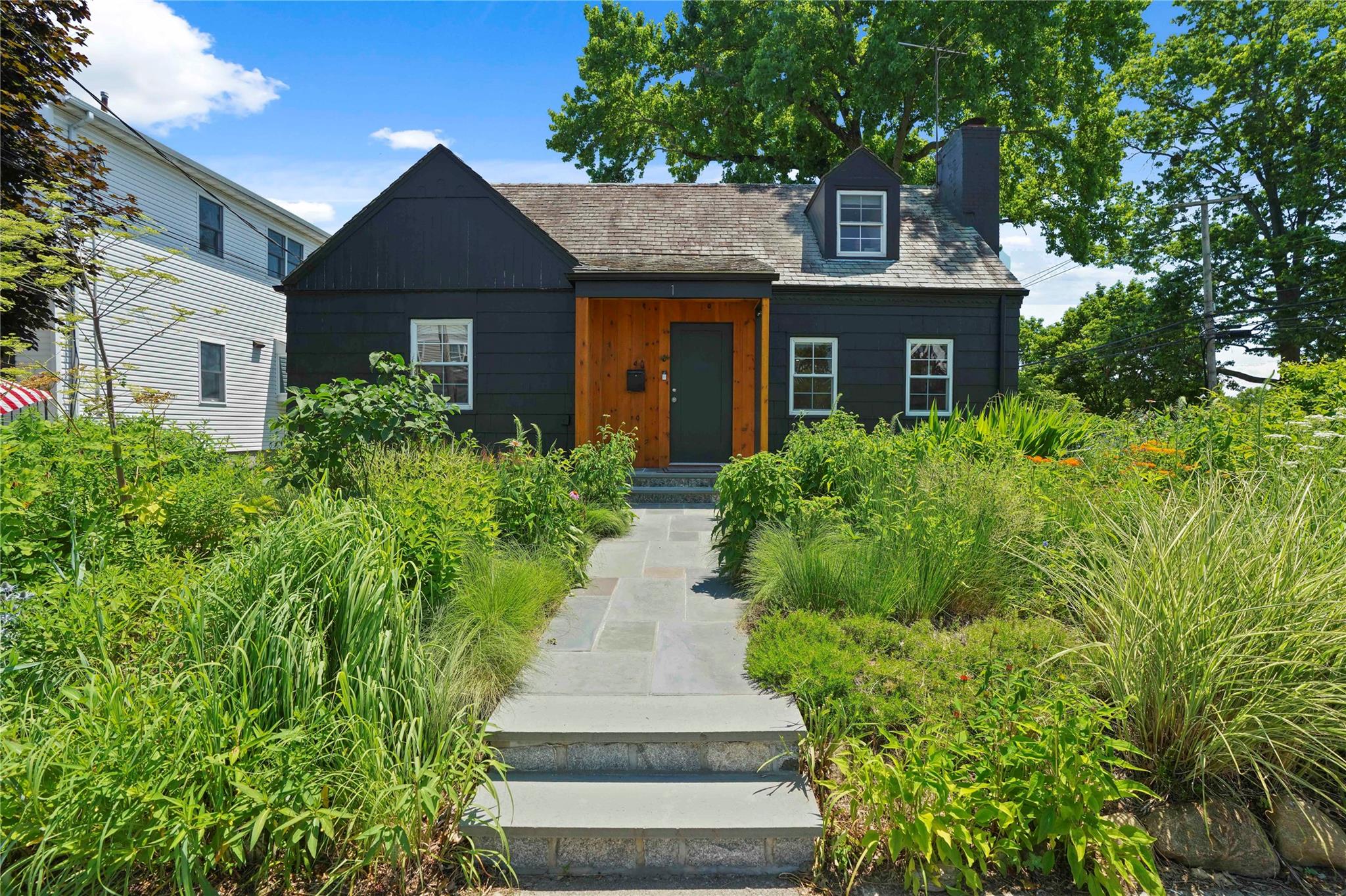 Welcome home to 1 Maple Avenue, where classic charm meets contemporary...