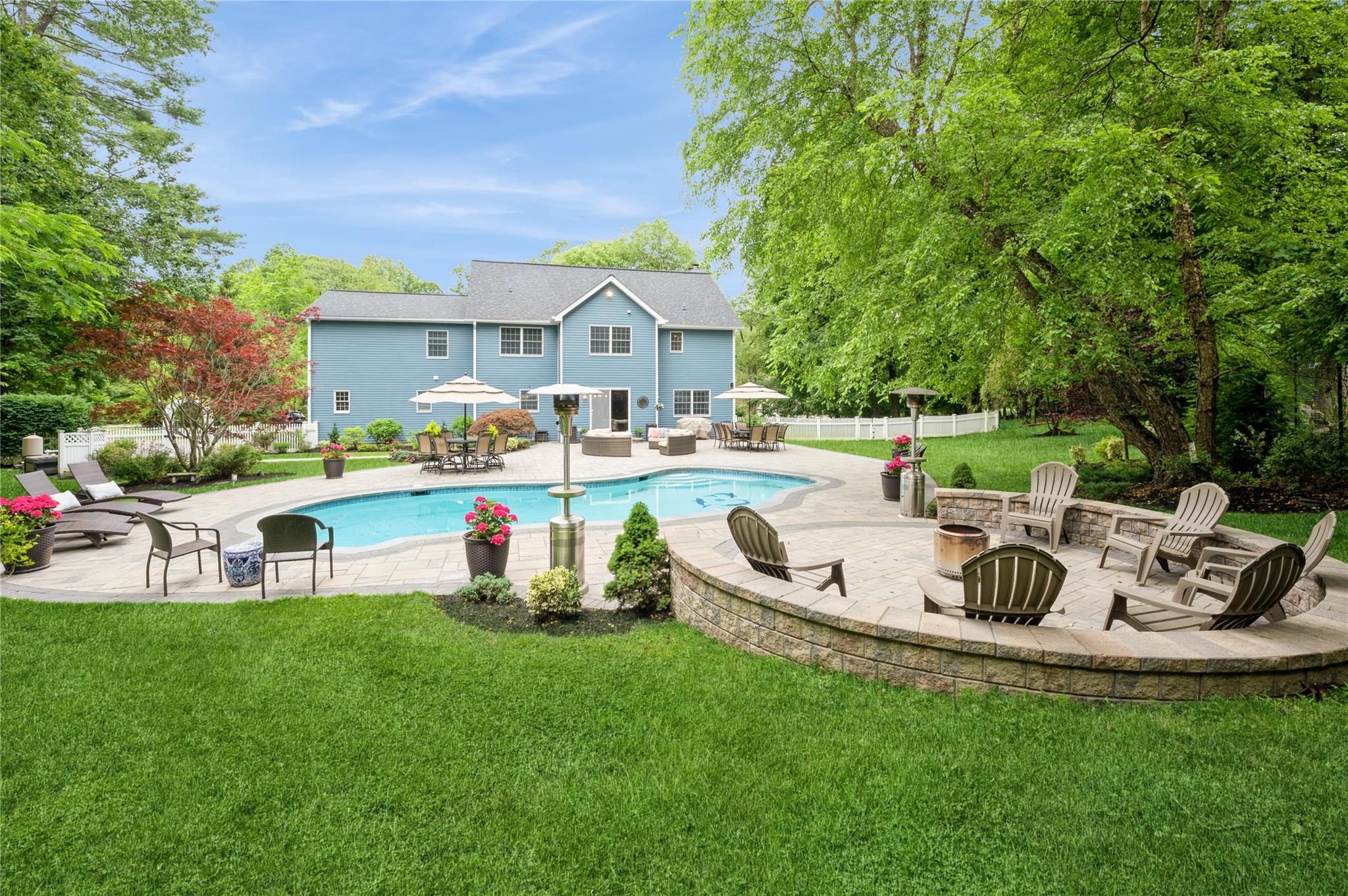 Nestled on a tranquil private road, this stunning Colonial home seamle...
