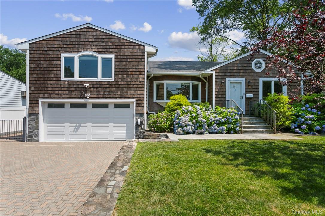 Loocated in the Scarsdale P.O. and situated within the Davis Elementar...