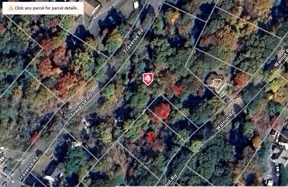 1.48 acres in Lake Peekskill. Property has 354' of rd. frontage on Tra...
