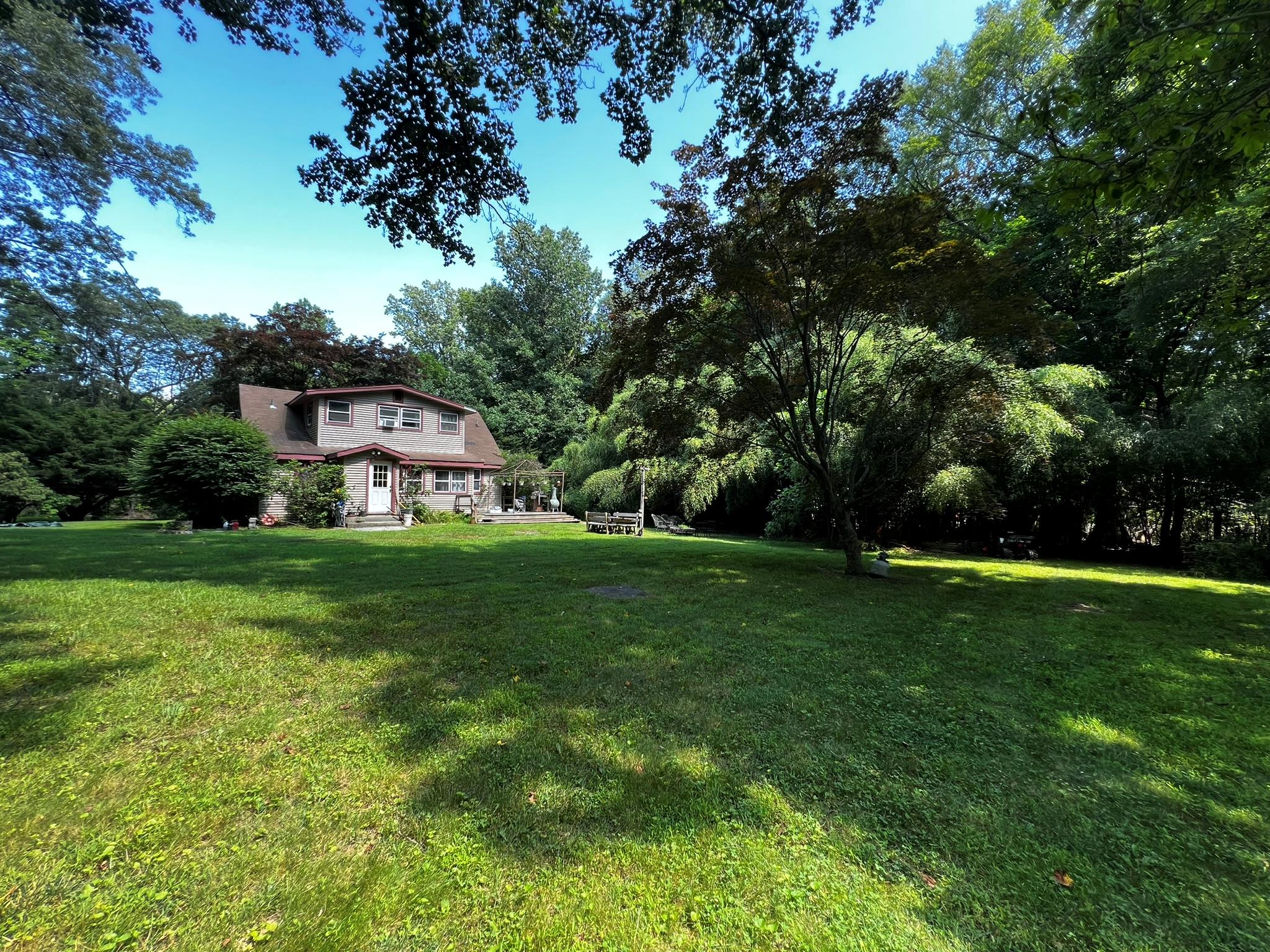 At the end of a cul-de-sac down a long private driveway lies this wond...