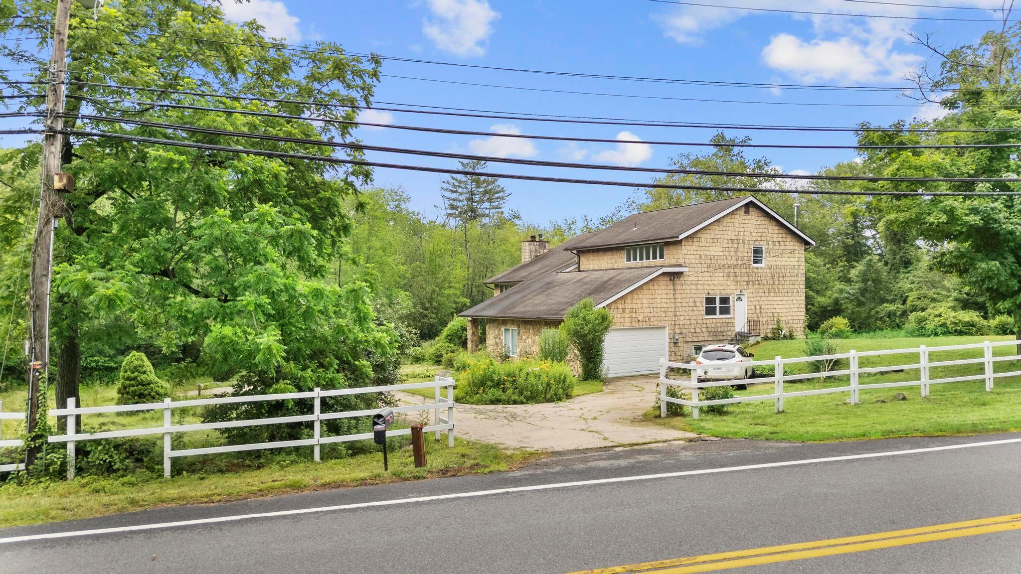 Move right in! Enjoy easy living in this beautiful, sun-filled, sprawl...