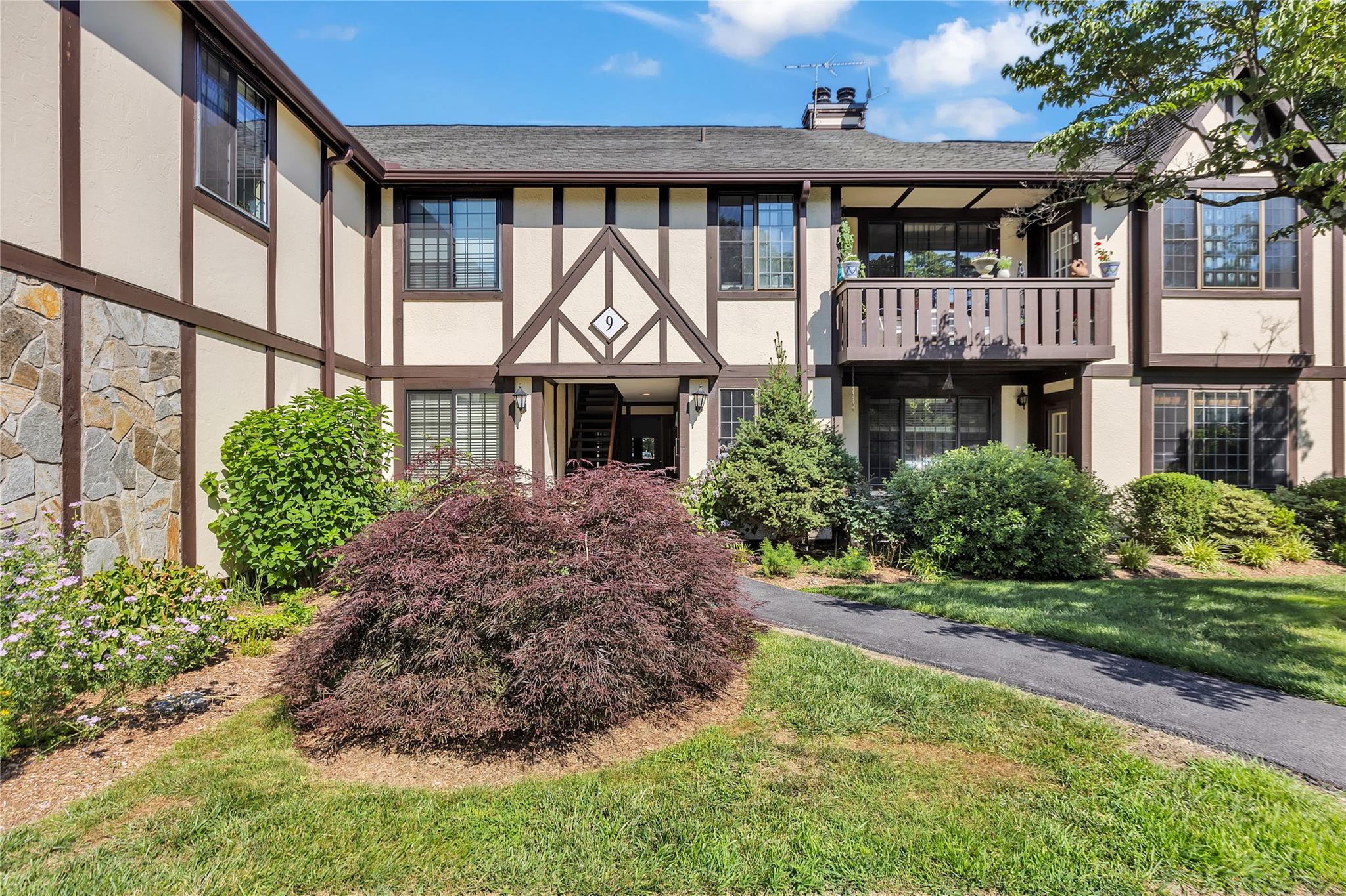 Sophistication meets comfort at this stunning Tudor-style residence in...