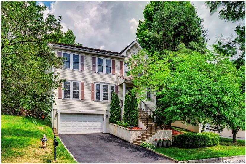 “A home where memories are made!” This beautifully designed, sun-fille...