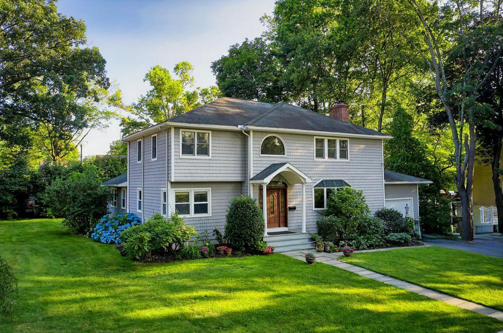 Welcome to this beautifully maintained Colonial, thoughtfully expanded...