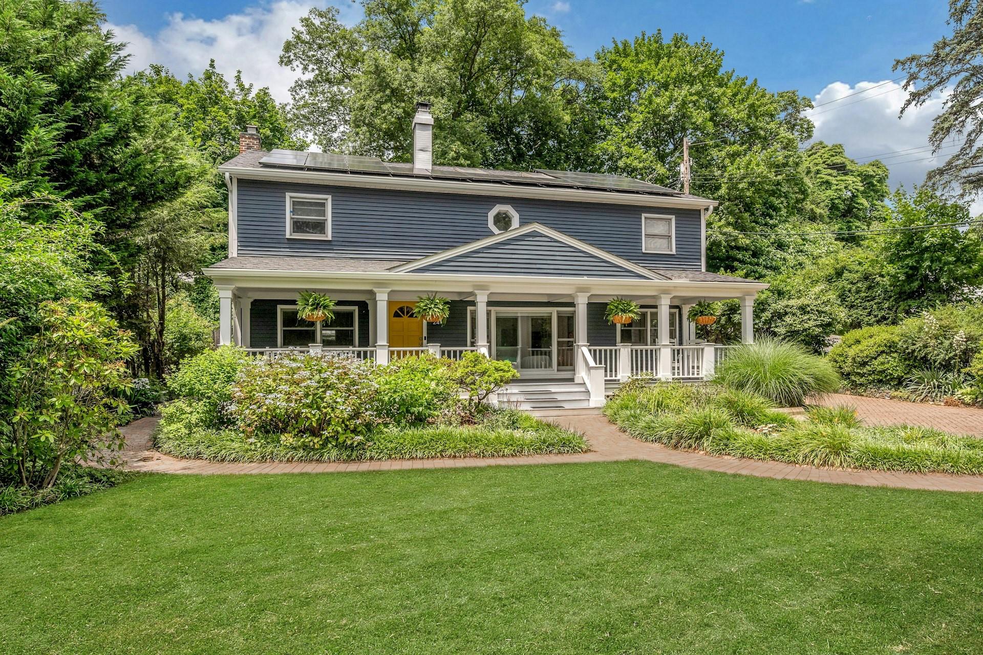 Thoughtfully designed colonial with vaulted ceilings and open layout i...