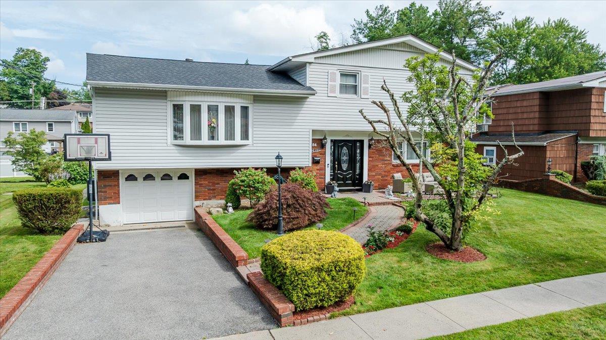 Welcome to 54 Maria Lane, an inviting split-level home located in the...