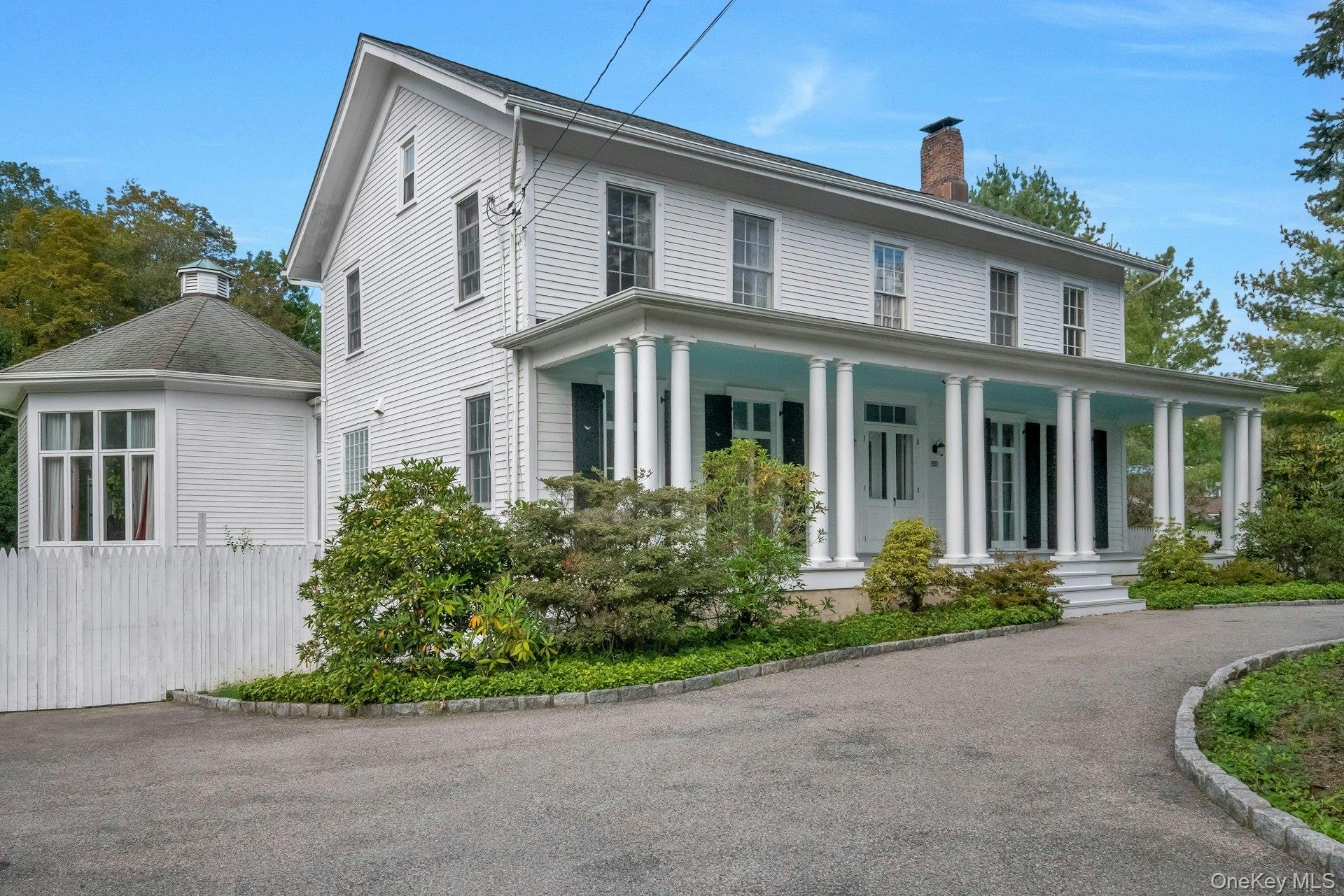 Welcome to this stunning Hudson Valley Greek Revival home, a rare arch...