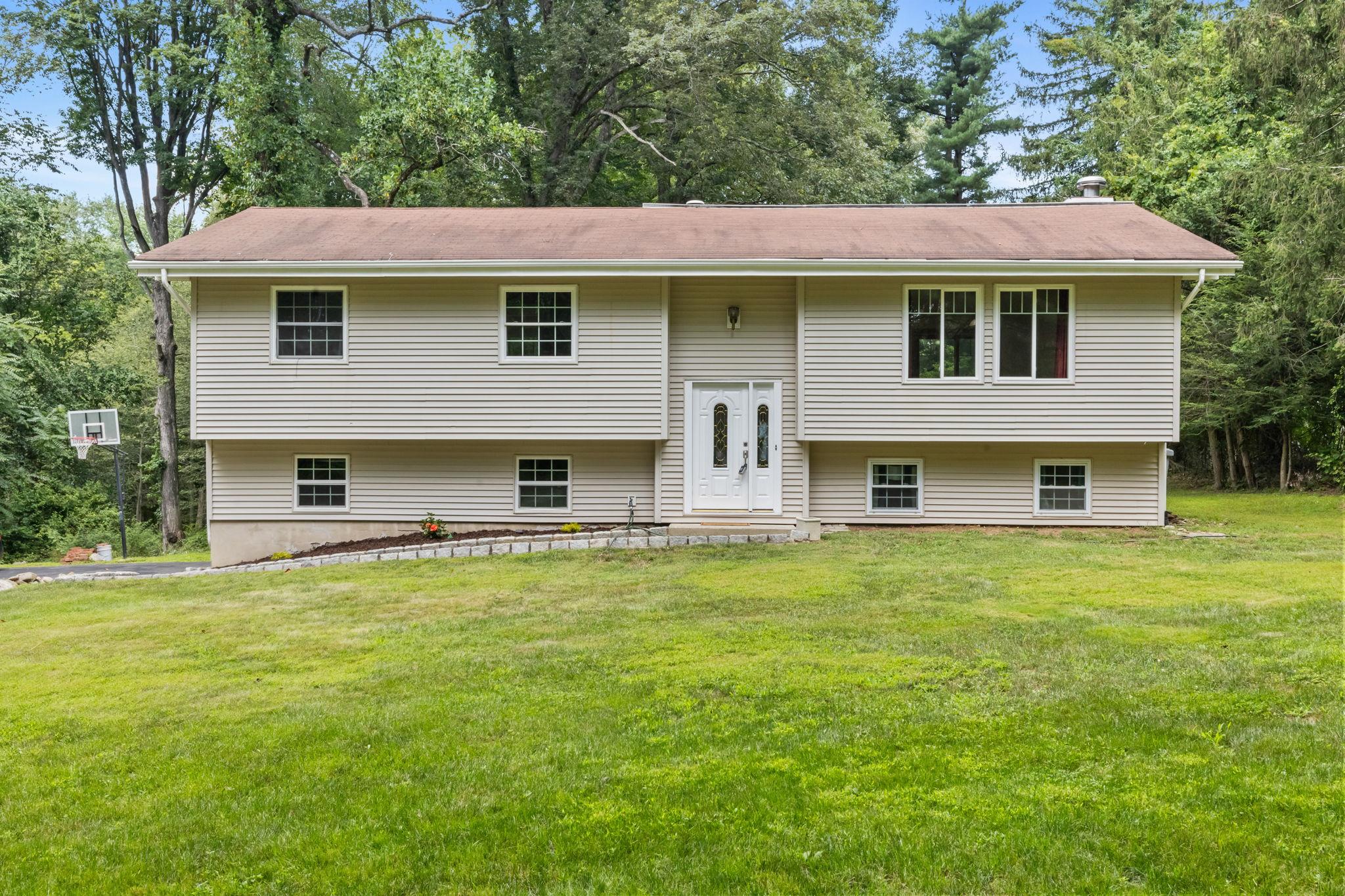 Tucked away at the end of a newly paved private drive, this inviting r...