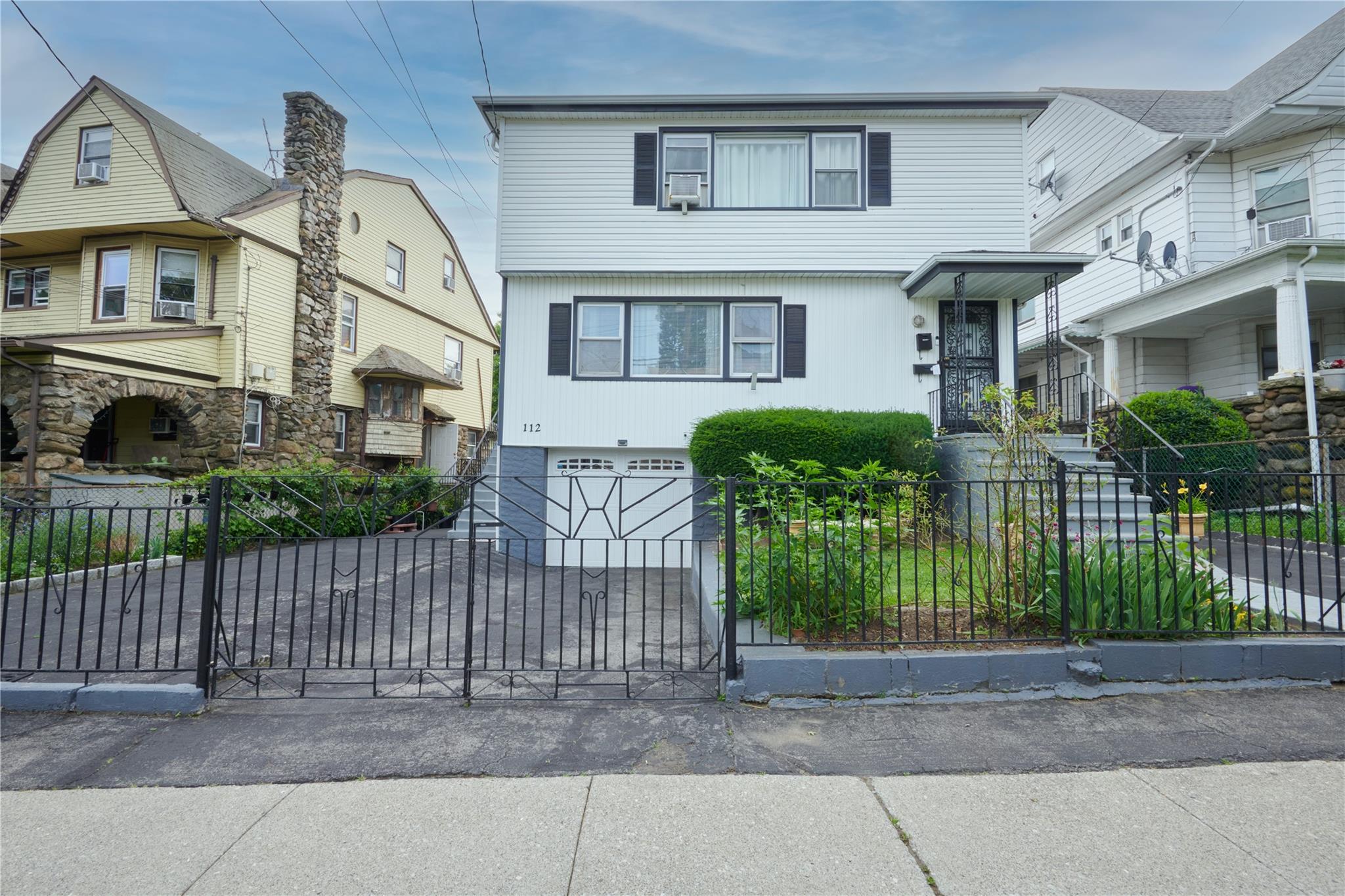 Welcome to 112 N Columbus Ave – a spacious and versatile two-family ho...