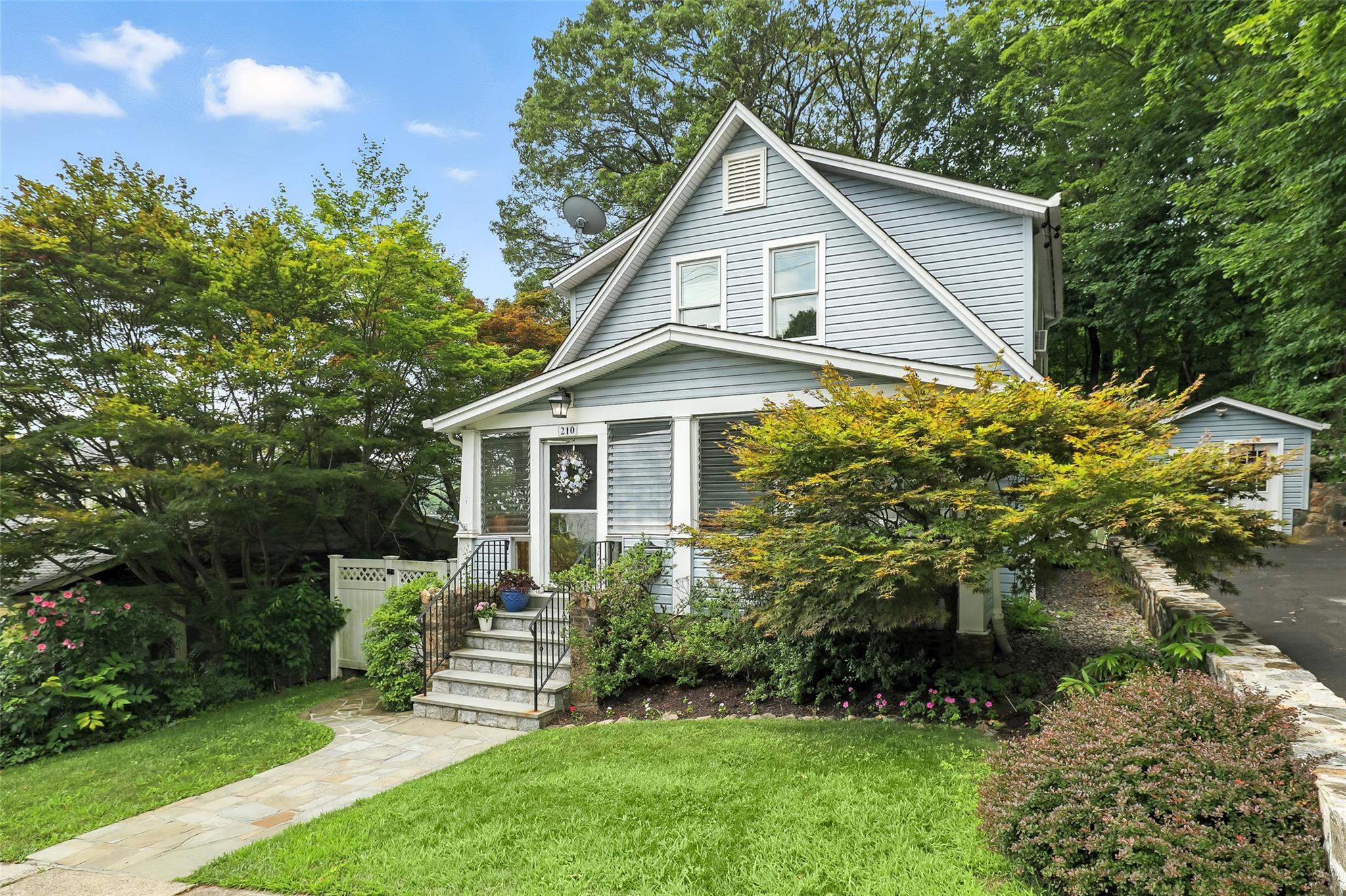 Step into this charming 1928-built colonial-style home, offering a per...