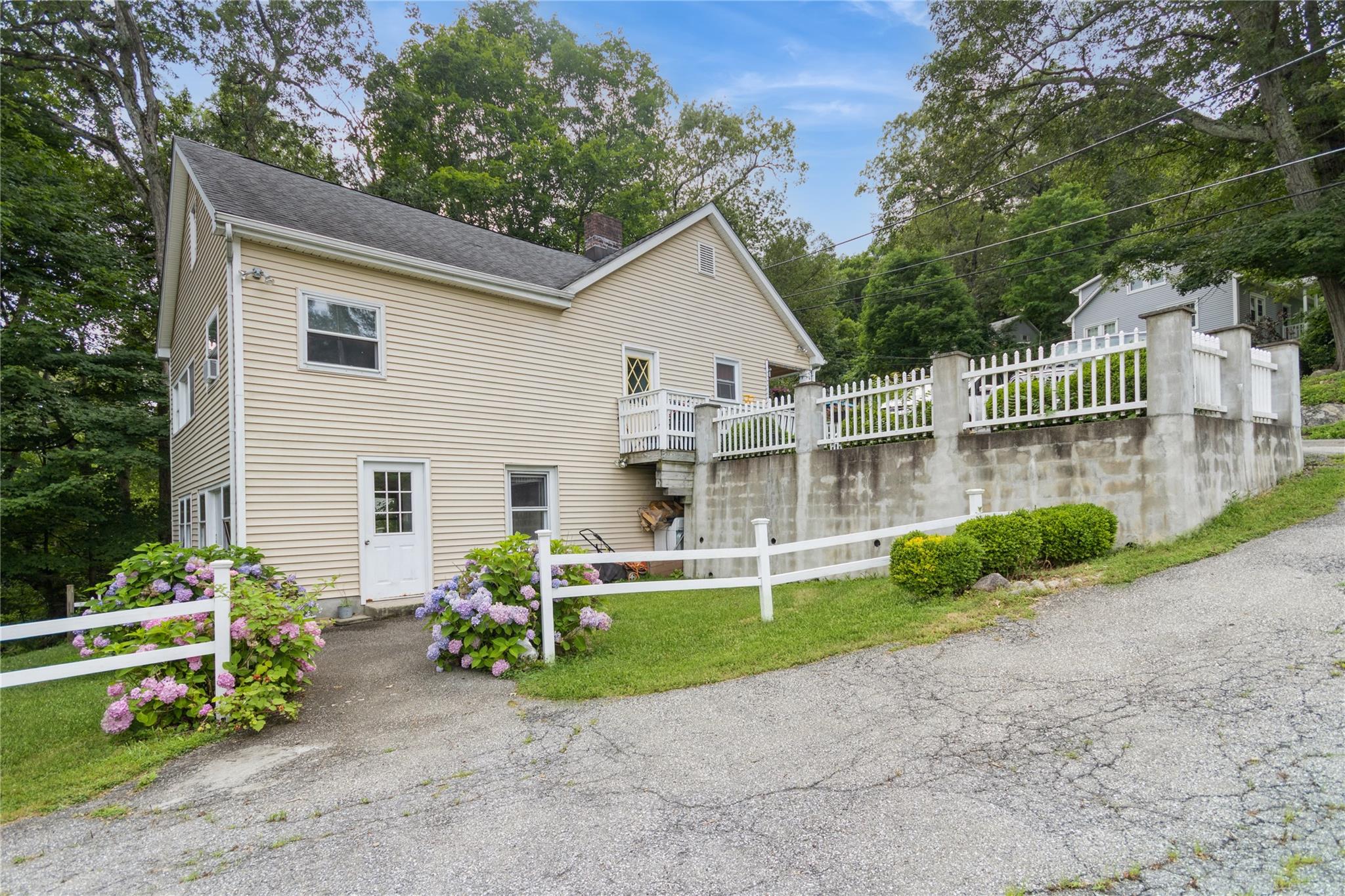 This is a two-family residence. The top unit consists of two bedrooms,...