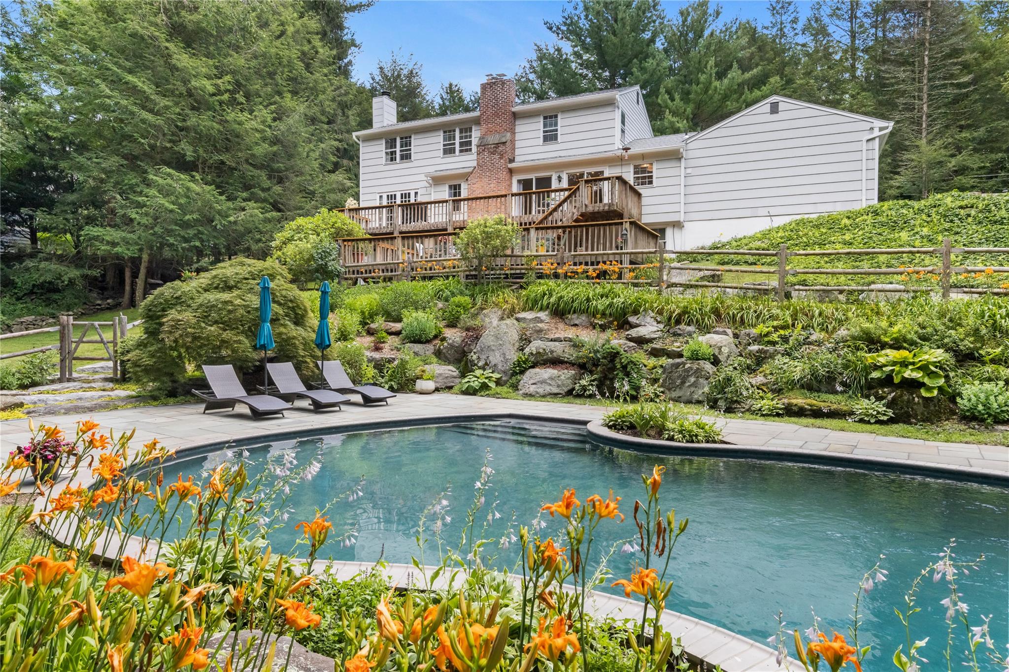Discover an exceptional lifestyle at 233 Upper Shad Road, a picture-pe...