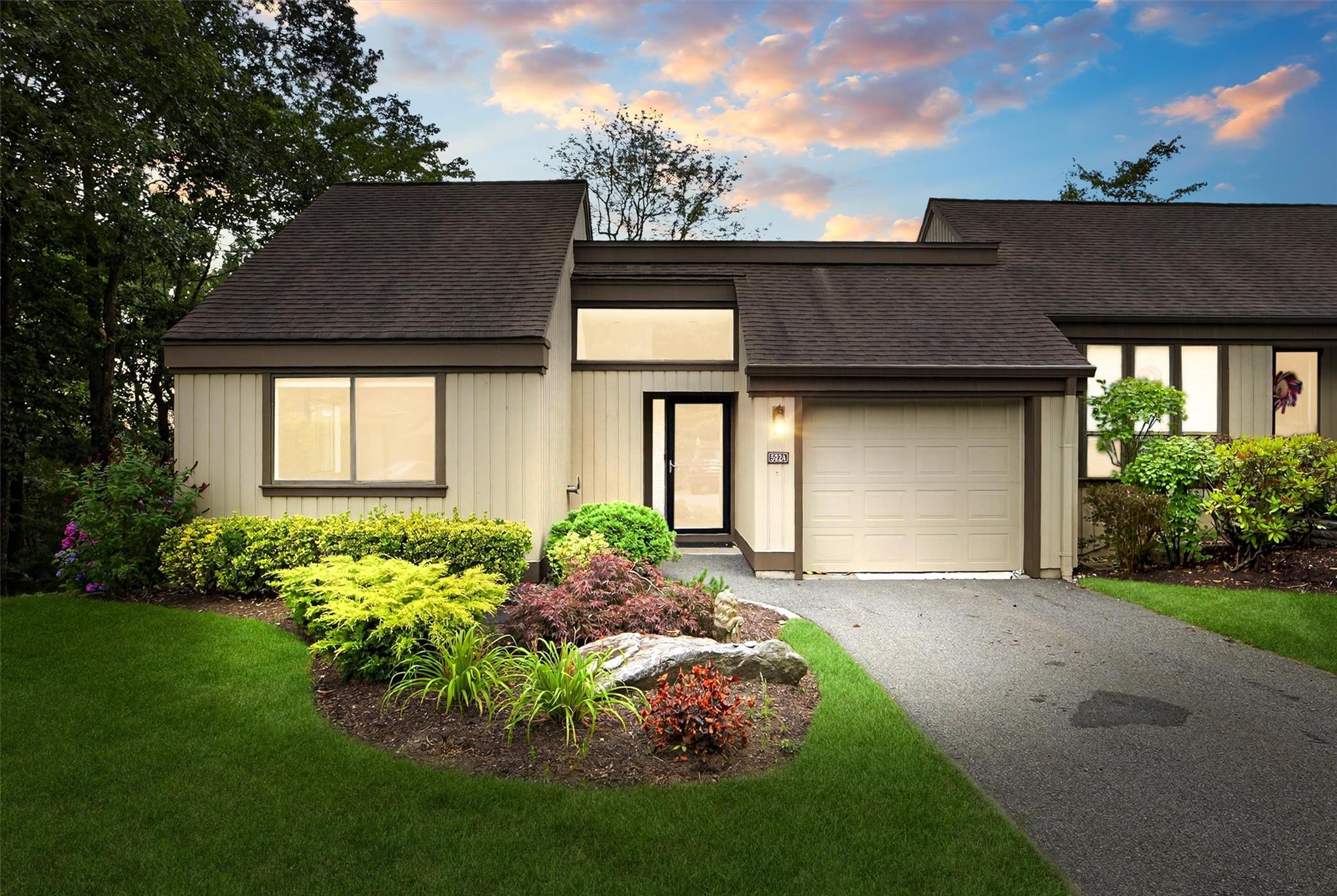 Welcome to 582 A Heritage Hills, lovely two-level Guilford end unit wi...