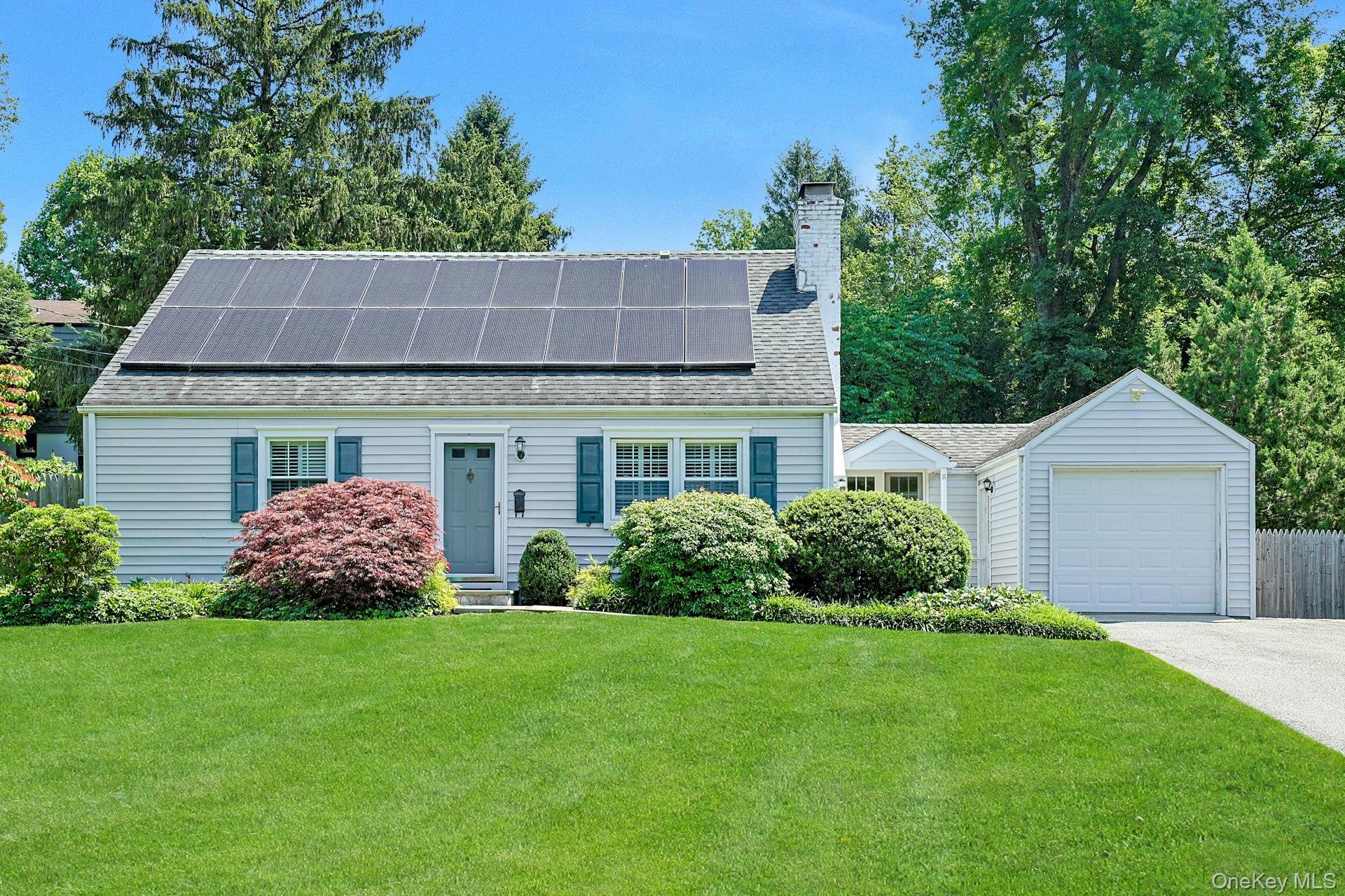 Charming and lovingly maintained cape cod home on beautiful private pr...
