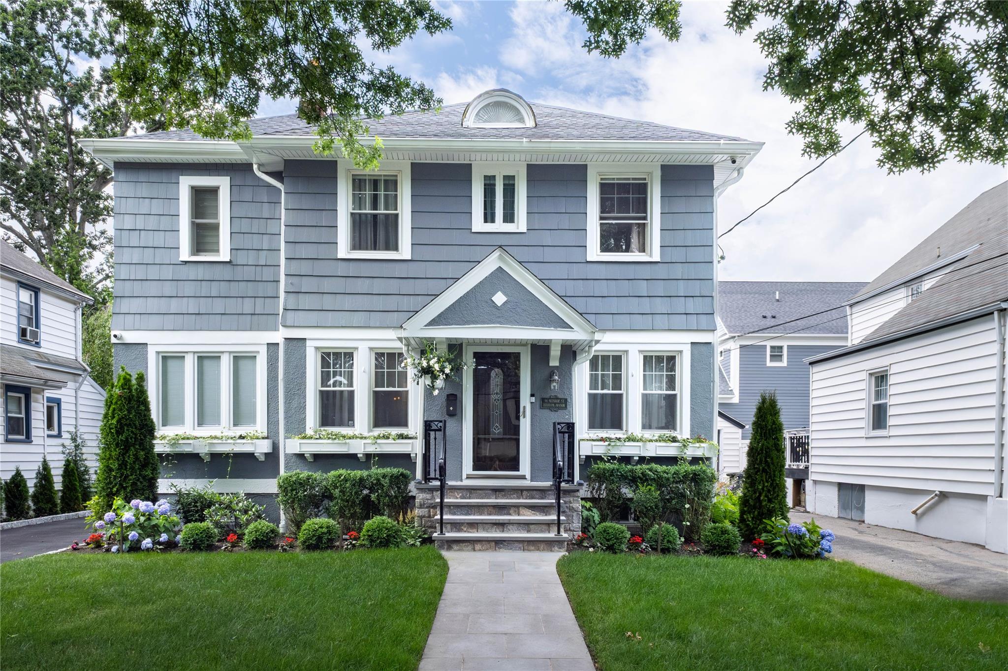 Sweet, special and move-in ready. Welcome Home to 91 Monroe Street, a...