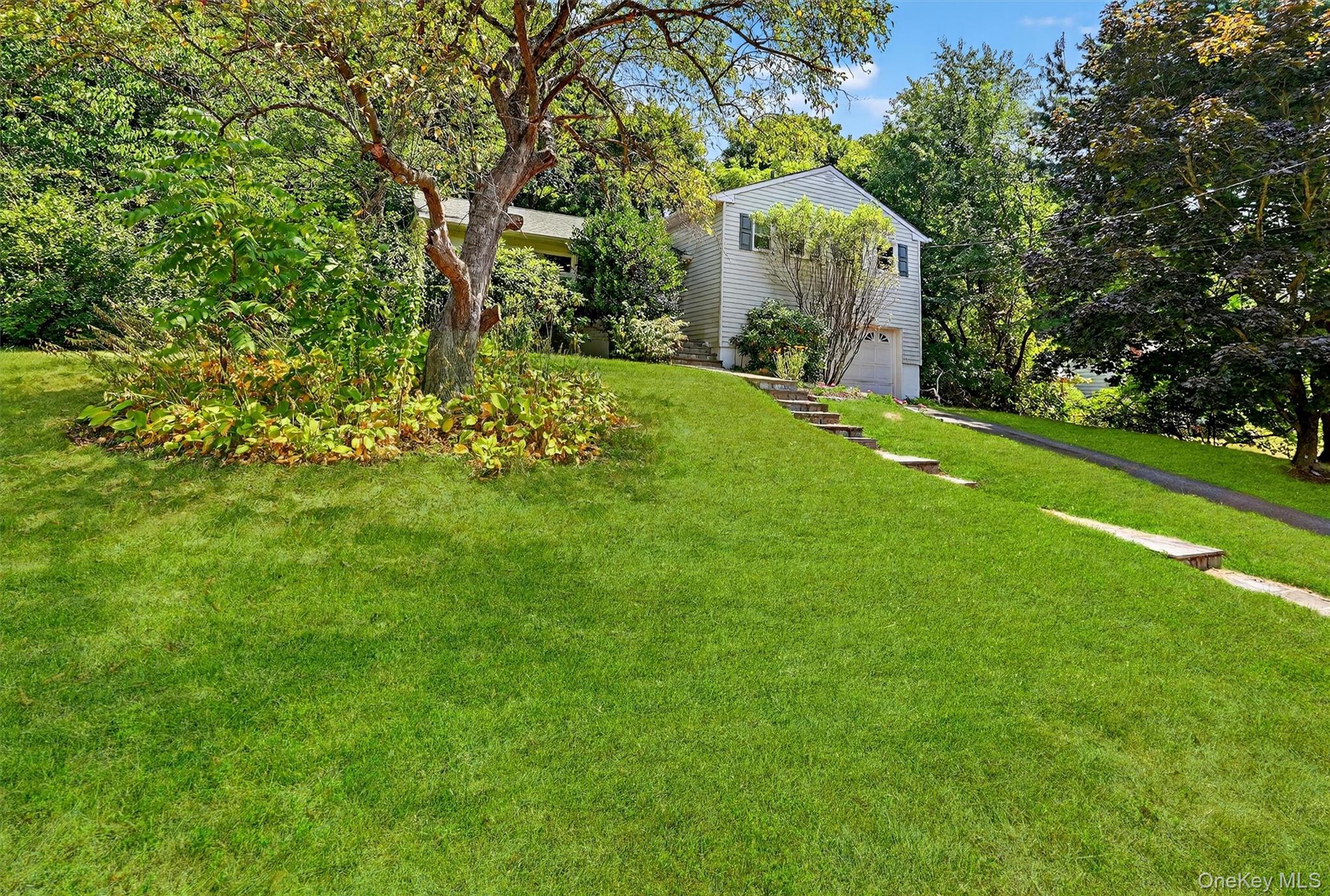 Nestled on a quiet, tree-lined cul-de-sac in the heart of sought-after...