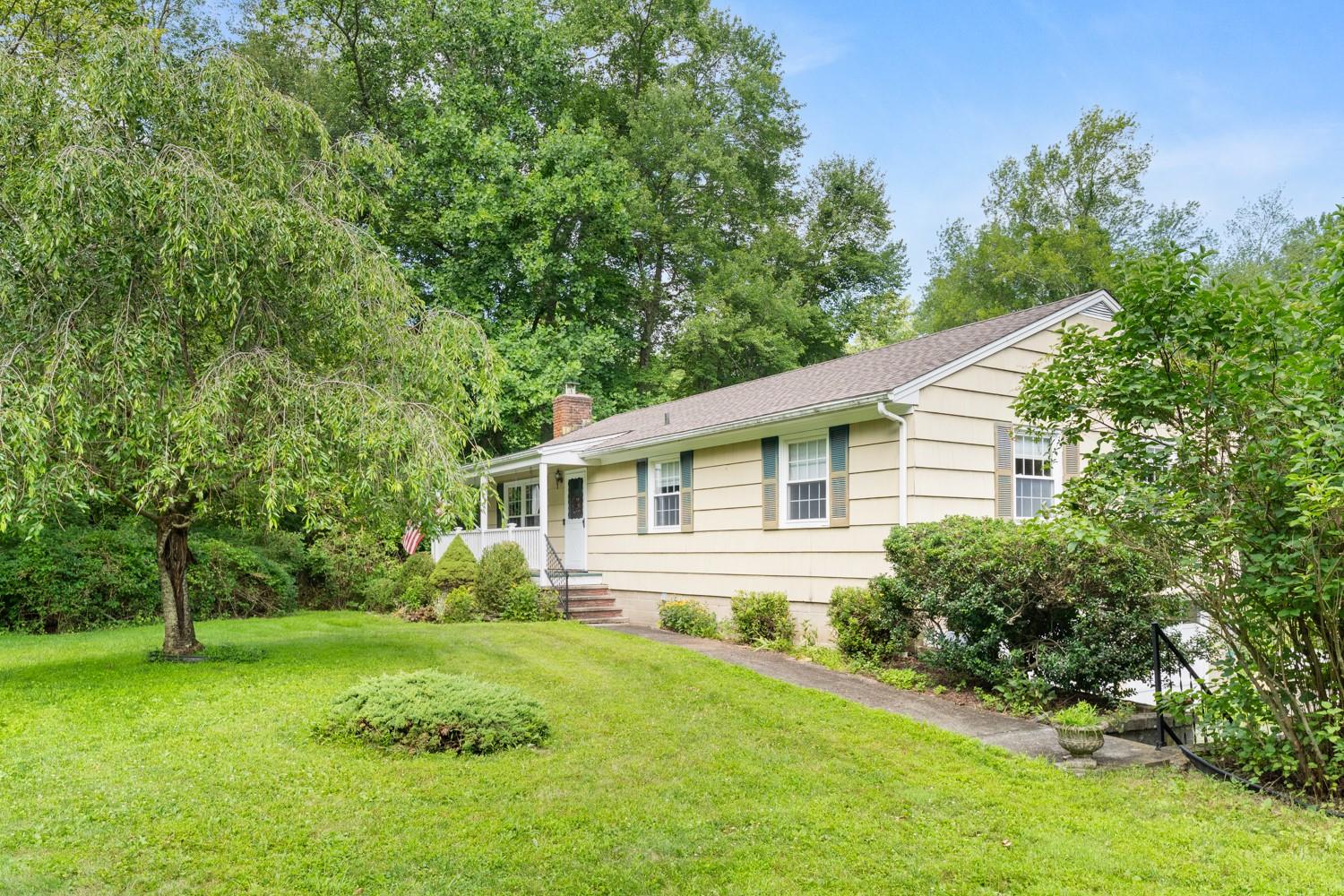 Step into the serene embrace of this charming Ranch-style home, where...