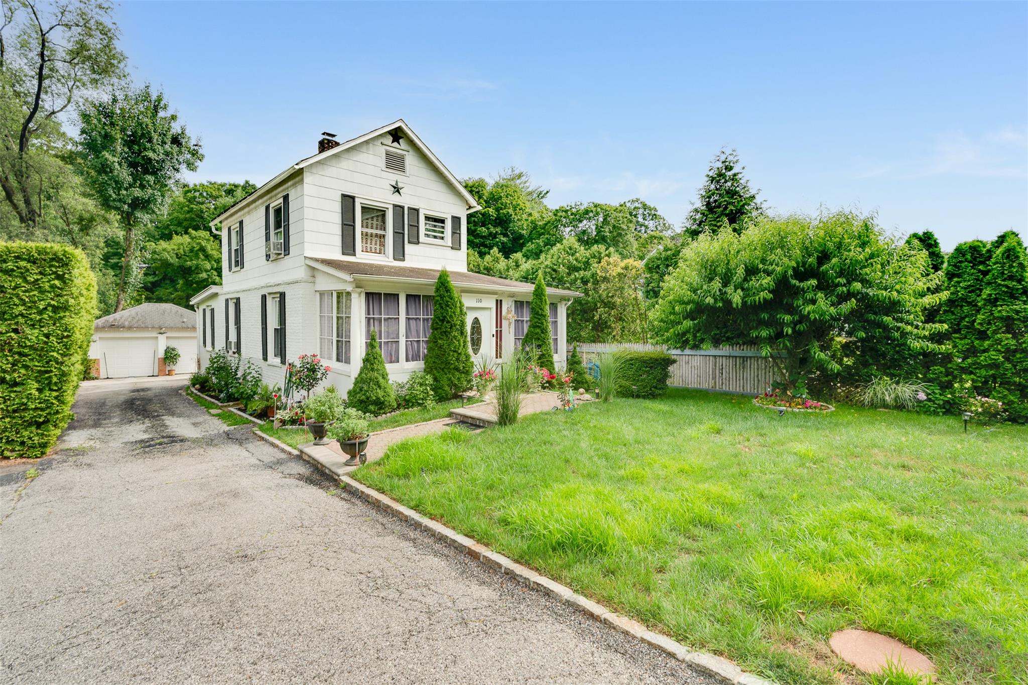 Fall in love with this charming colonial-style home offering endless p...