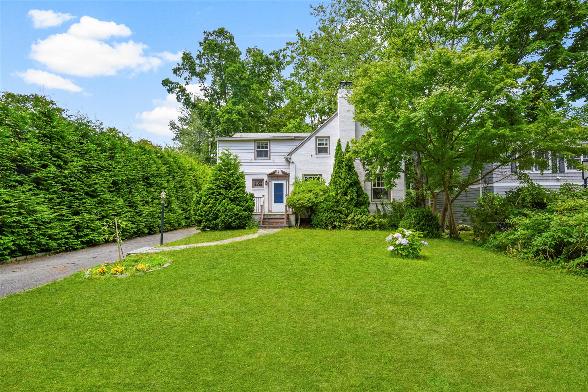 Move right into this gracious three-bedroom, three-bath Colonial and e...