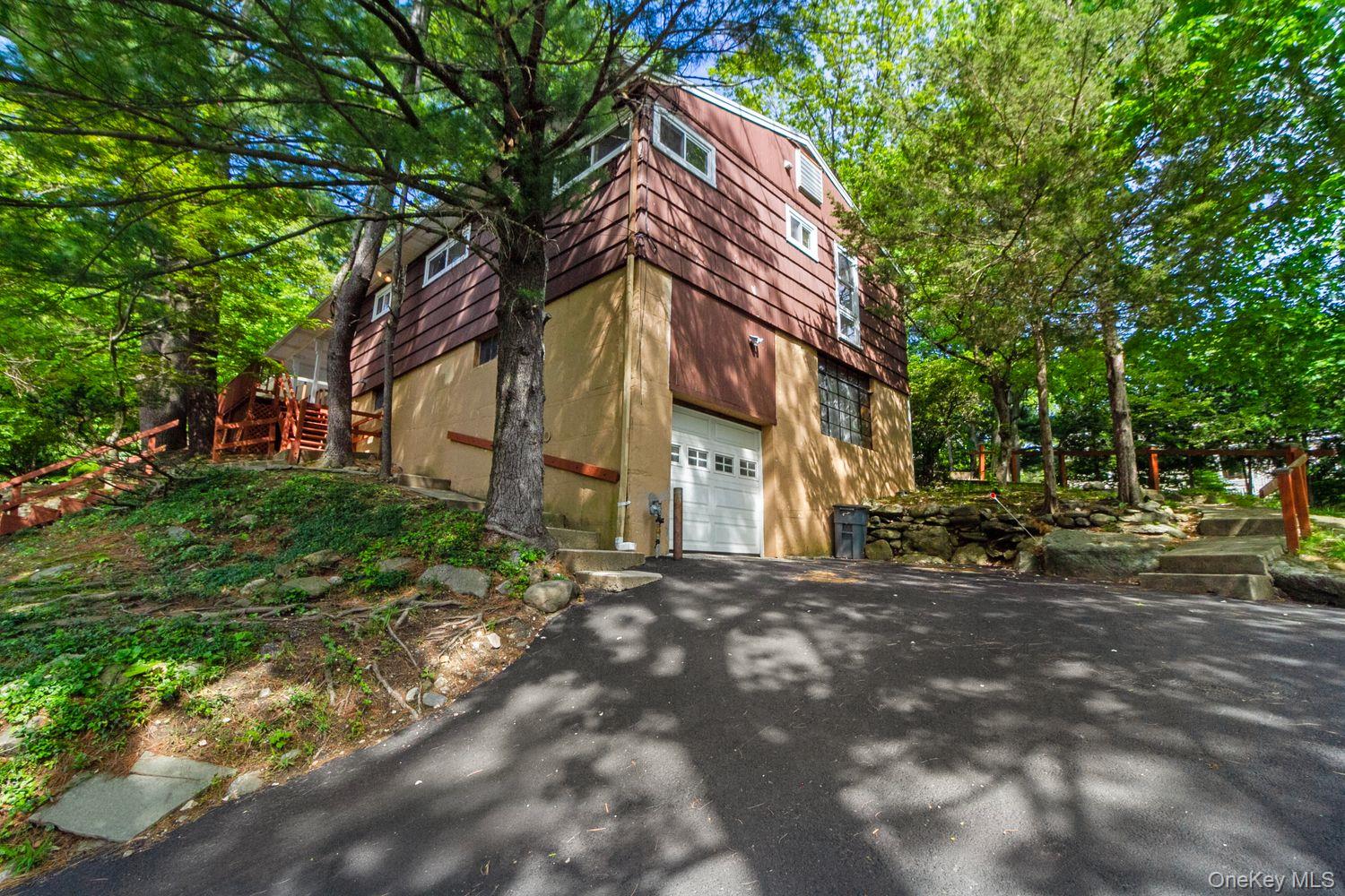 This open midcentury ranch in the Ardsley school district offers easy,...