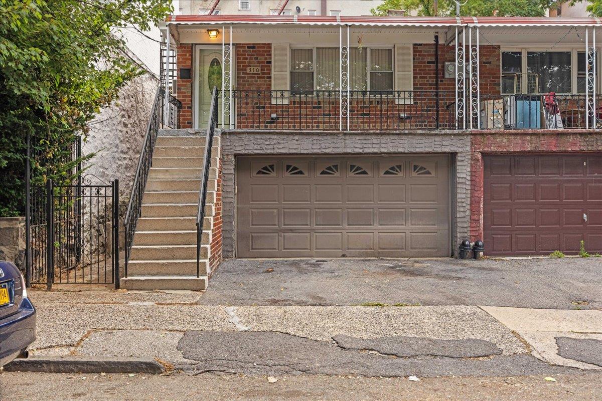 Discover the potential of this multifamily home at 310 Woodworth Avenu...