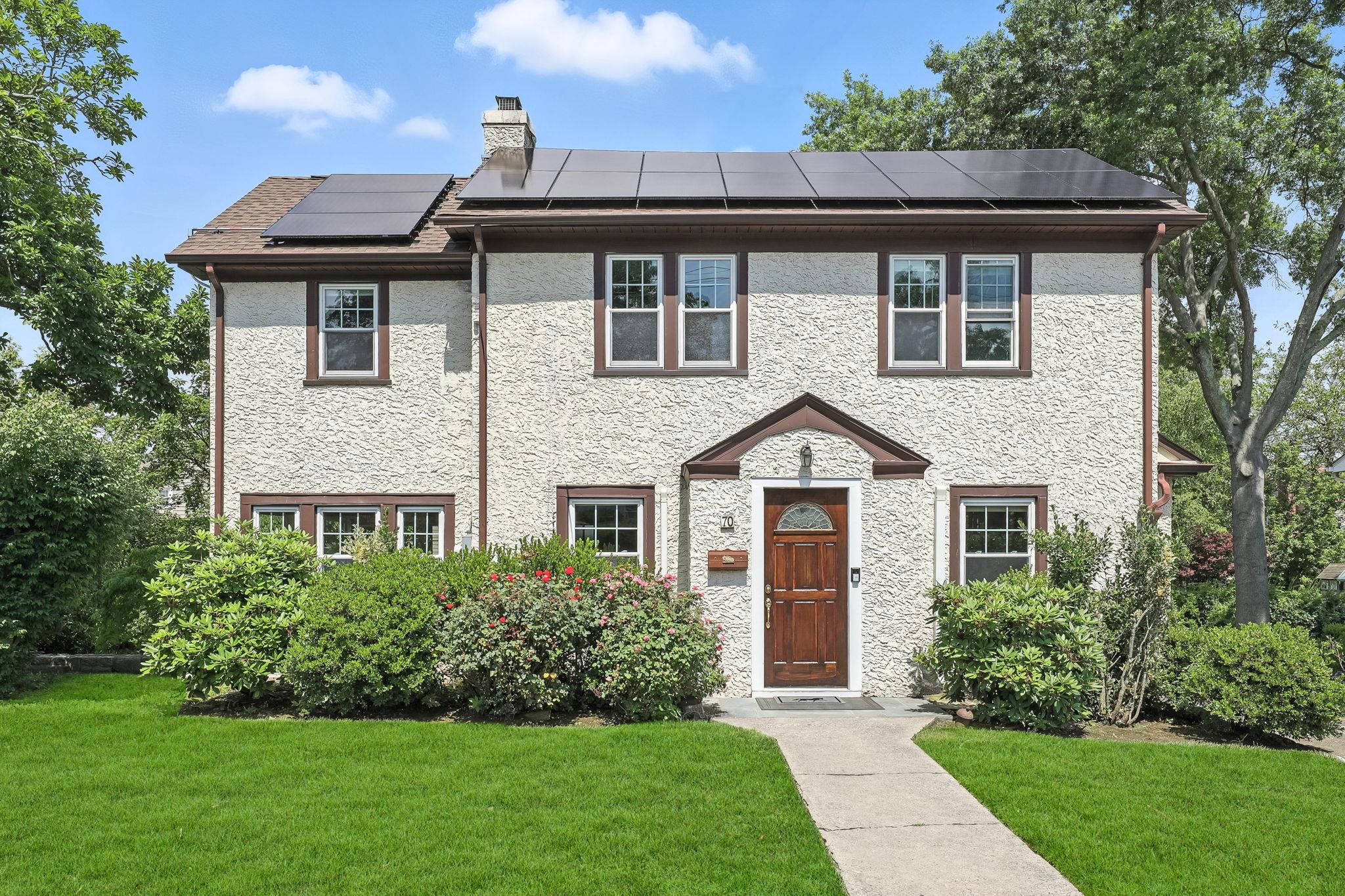 This sun-filled charming Tudor offers the perfect blend of charm, spac...