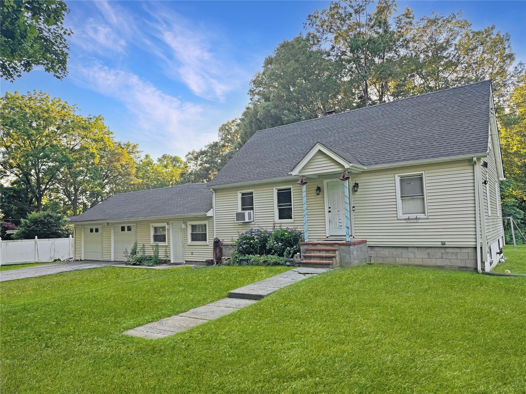 Move right into this charming Cape at the end of a quiet cul-de-sac! O...
