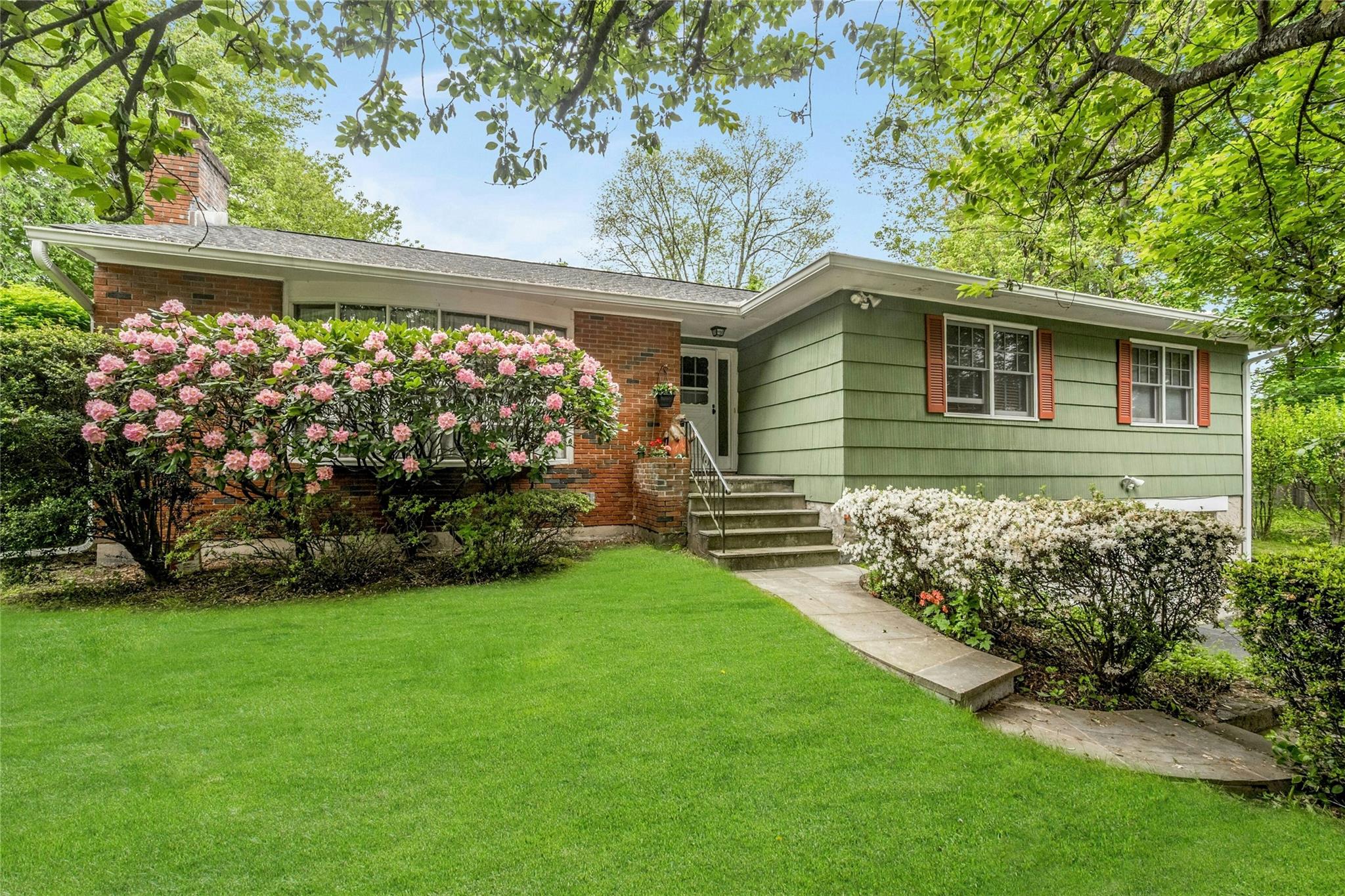 Welcome home to 263 Memorial Drive, a delightful 4-bedroom, 2-bathroom...