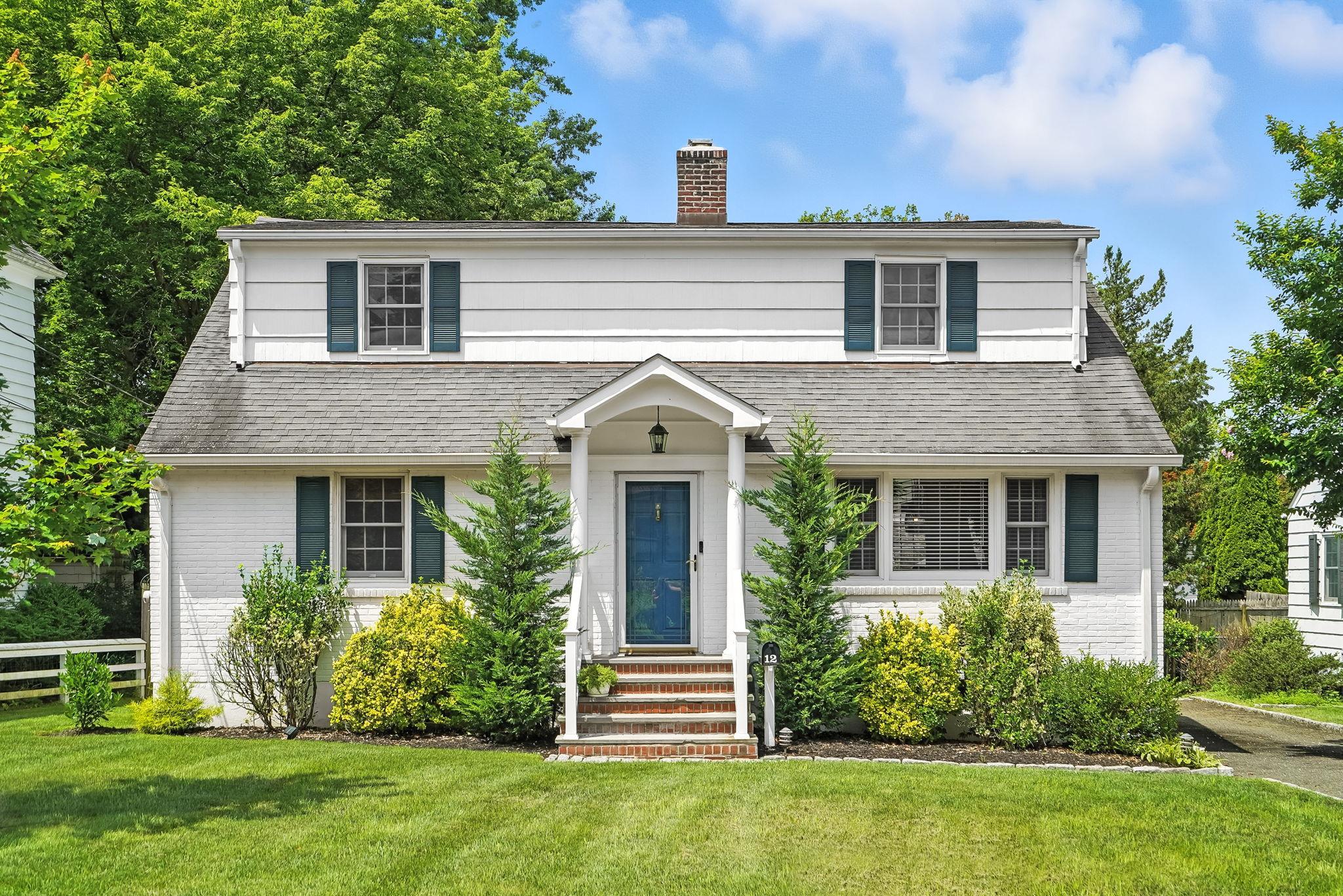 Welcome to this bright and charming 4-bedroom and two bath classic Cap...