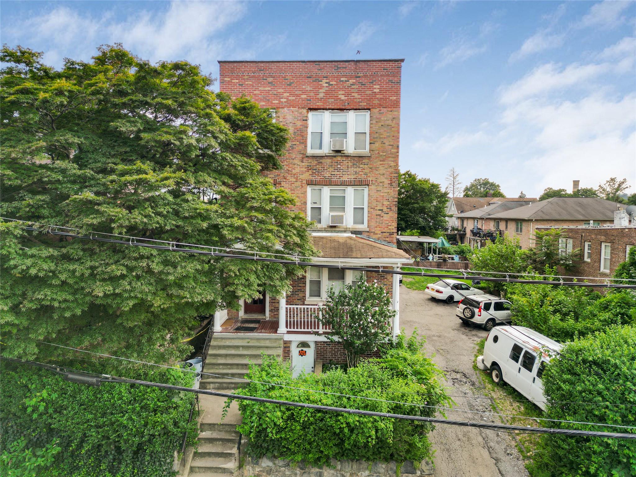 Welcome to 28 Palmer Road, Yonkers, a tremendous all Brick 6 Family Ho...