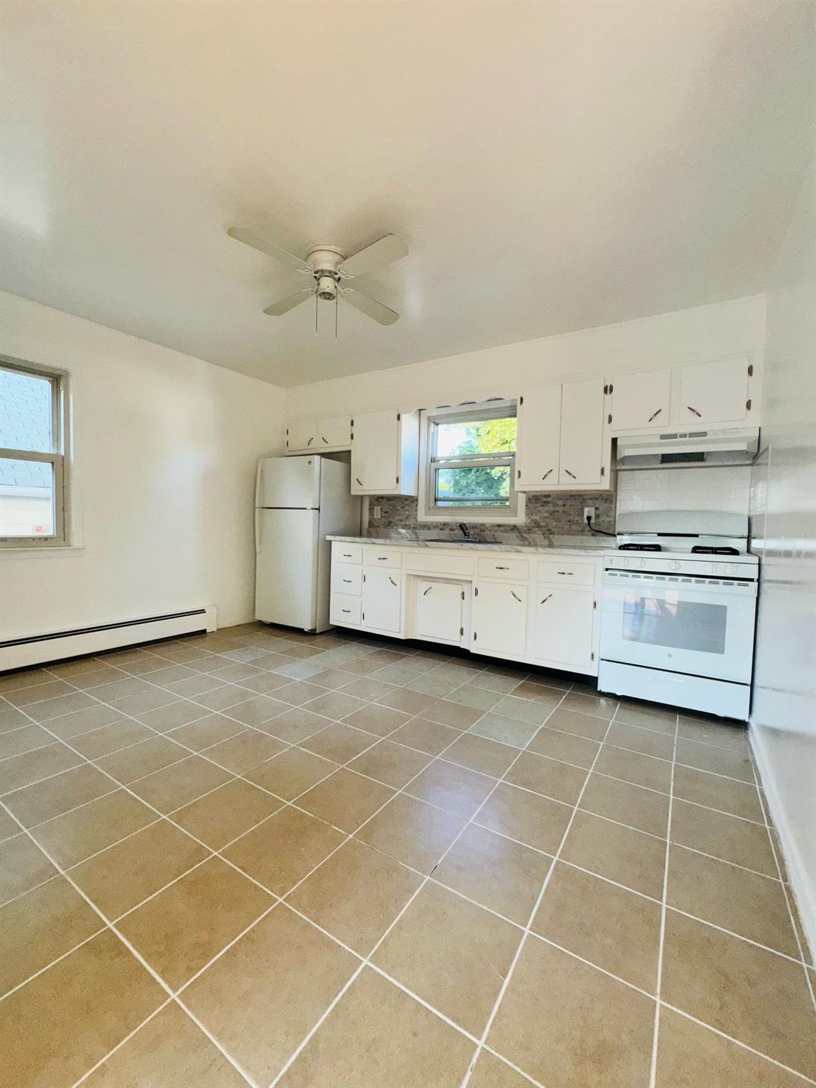 Welcome to 429 S 3rd Ave, a bright and modern 2-bedroom apartment loca...
