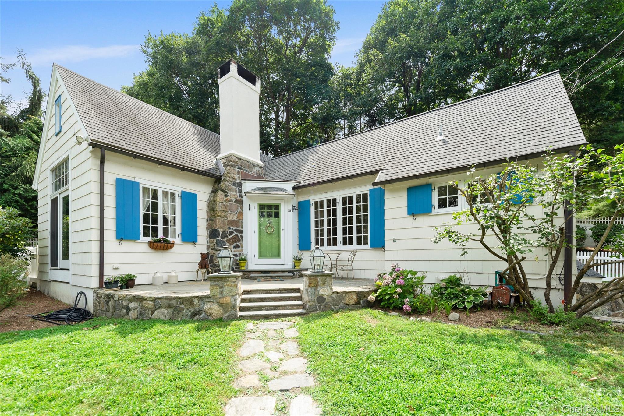 This charming cottage offers classic period architecture and serene vi...