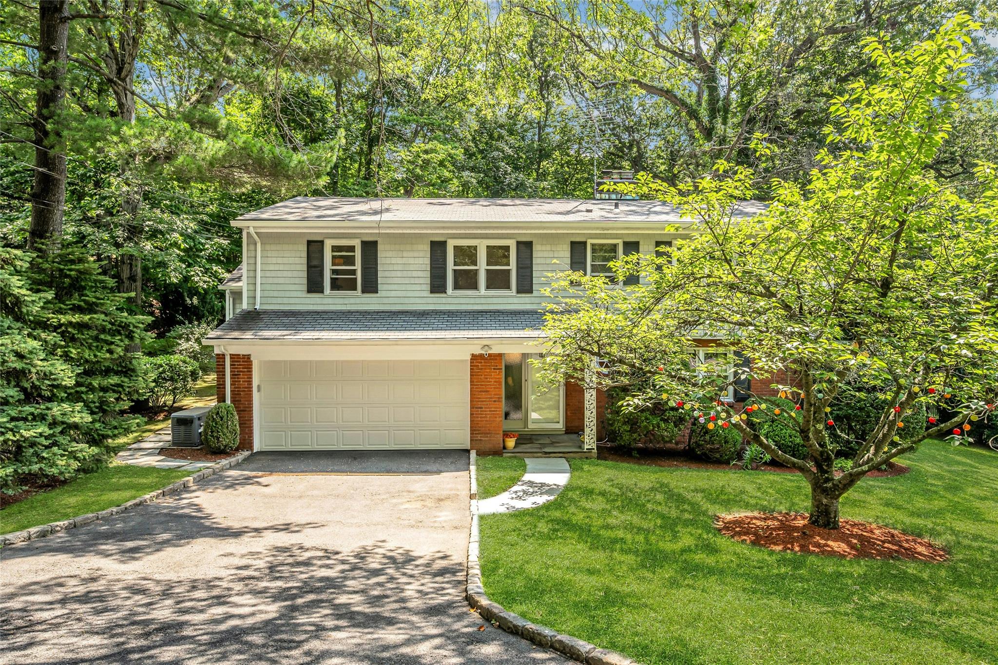 Tucked away on a quiet cul-de-sac off Fenimore Road, 9 Country Road is...