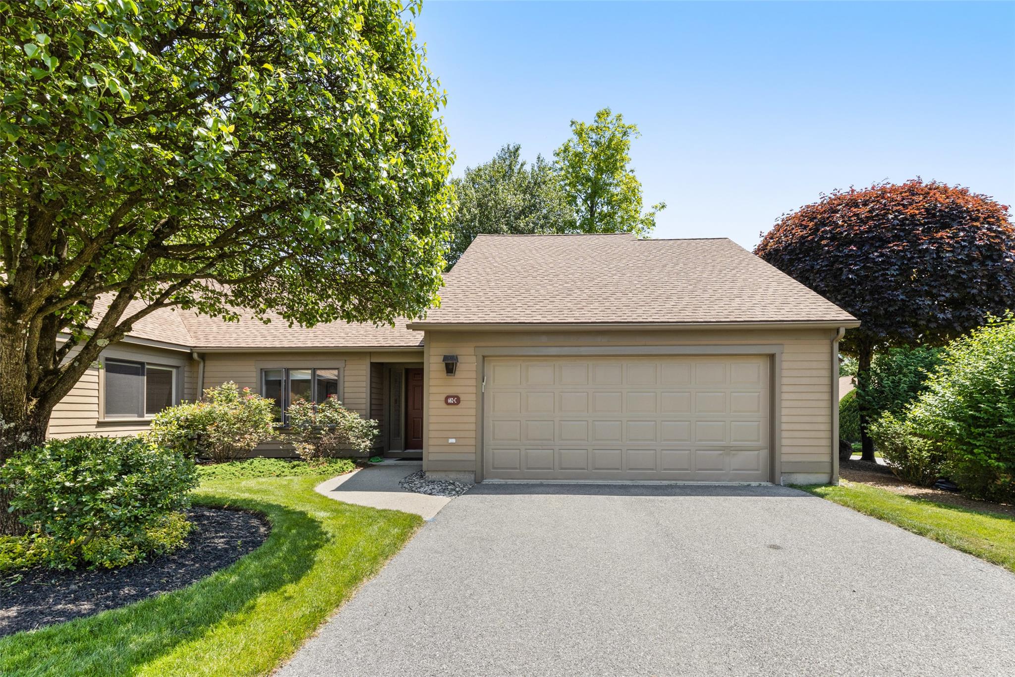 Beautiful Sherman II one-level, end unit with 2-car garage. For Sale o...
