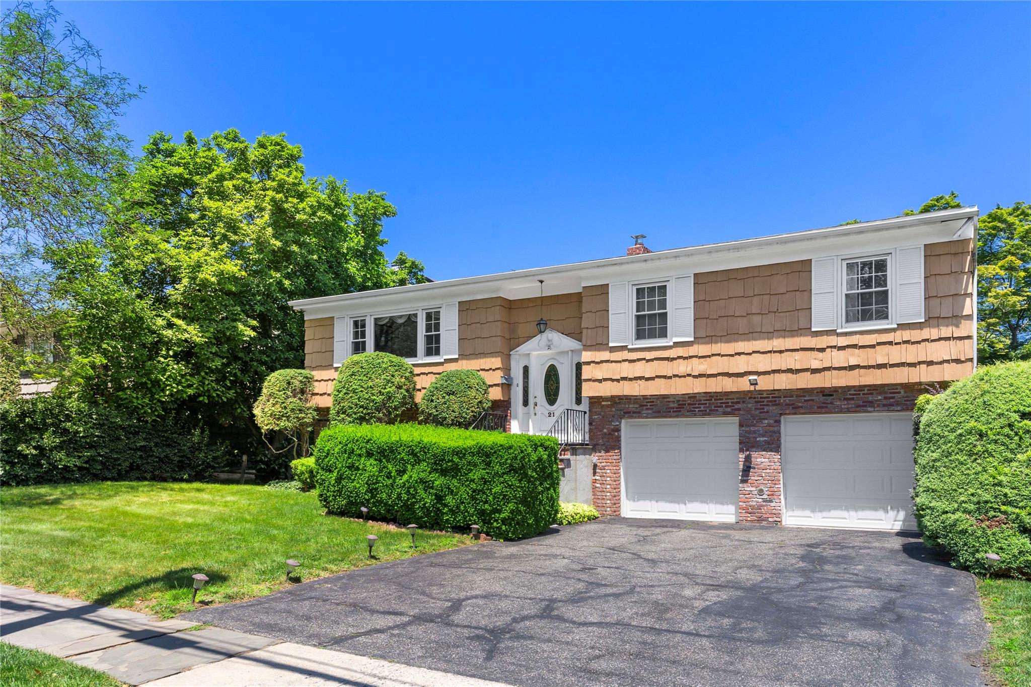 Welcome to 21 Ellwood Avenue, a sun-drenched single-family gem in the...