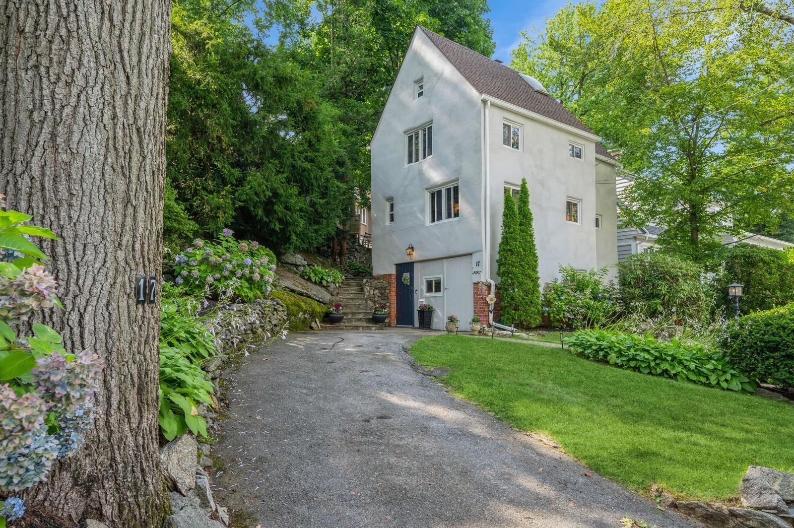 This wonderful 1929 Tudor is situated on a quiet tree-lined street.  J...